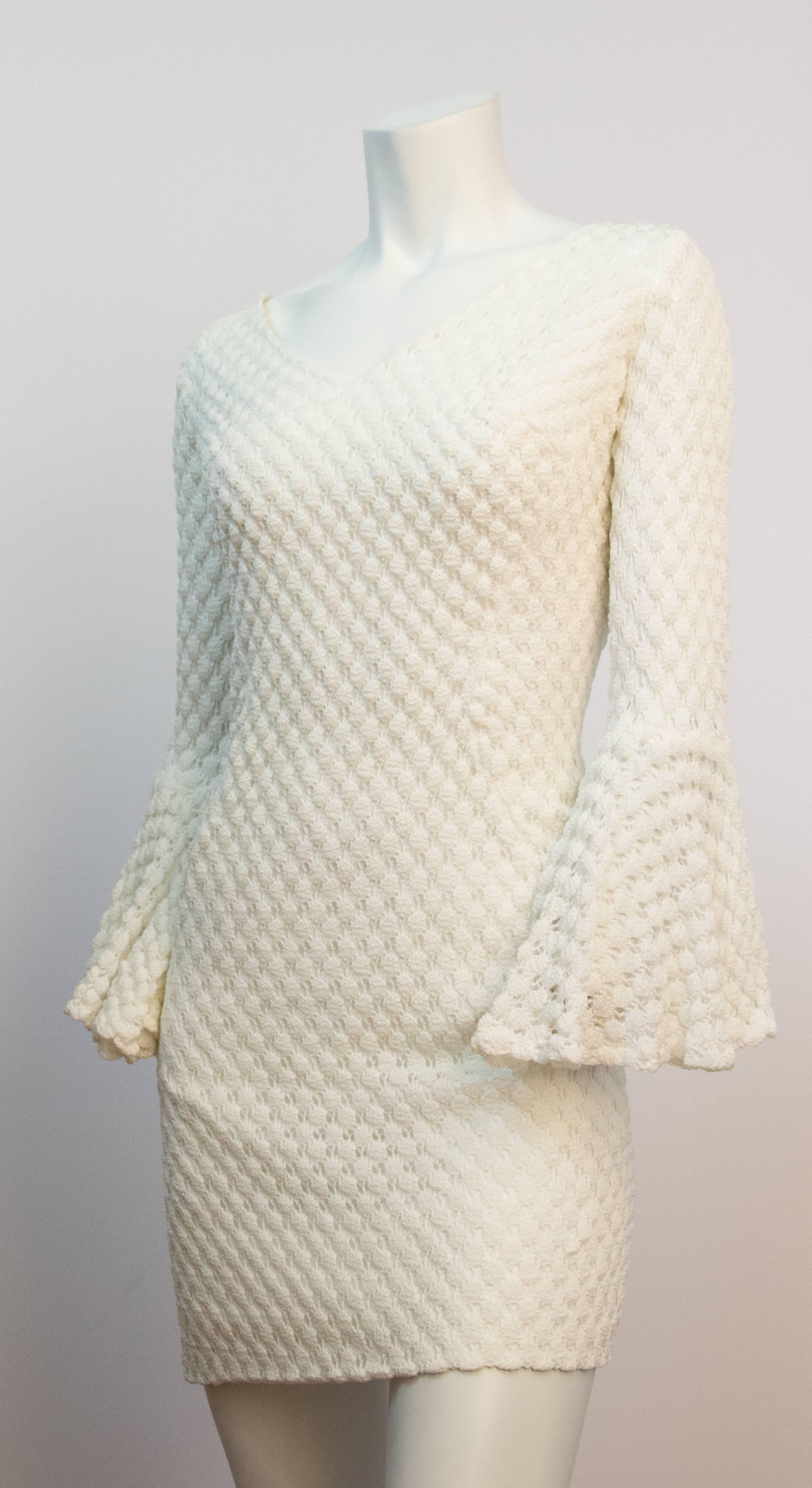 60s White Crochet Mini Dress with Bell Sleeves. Body of dress is lined, sleeves are not lined. Metal zipper up back. Fitted

