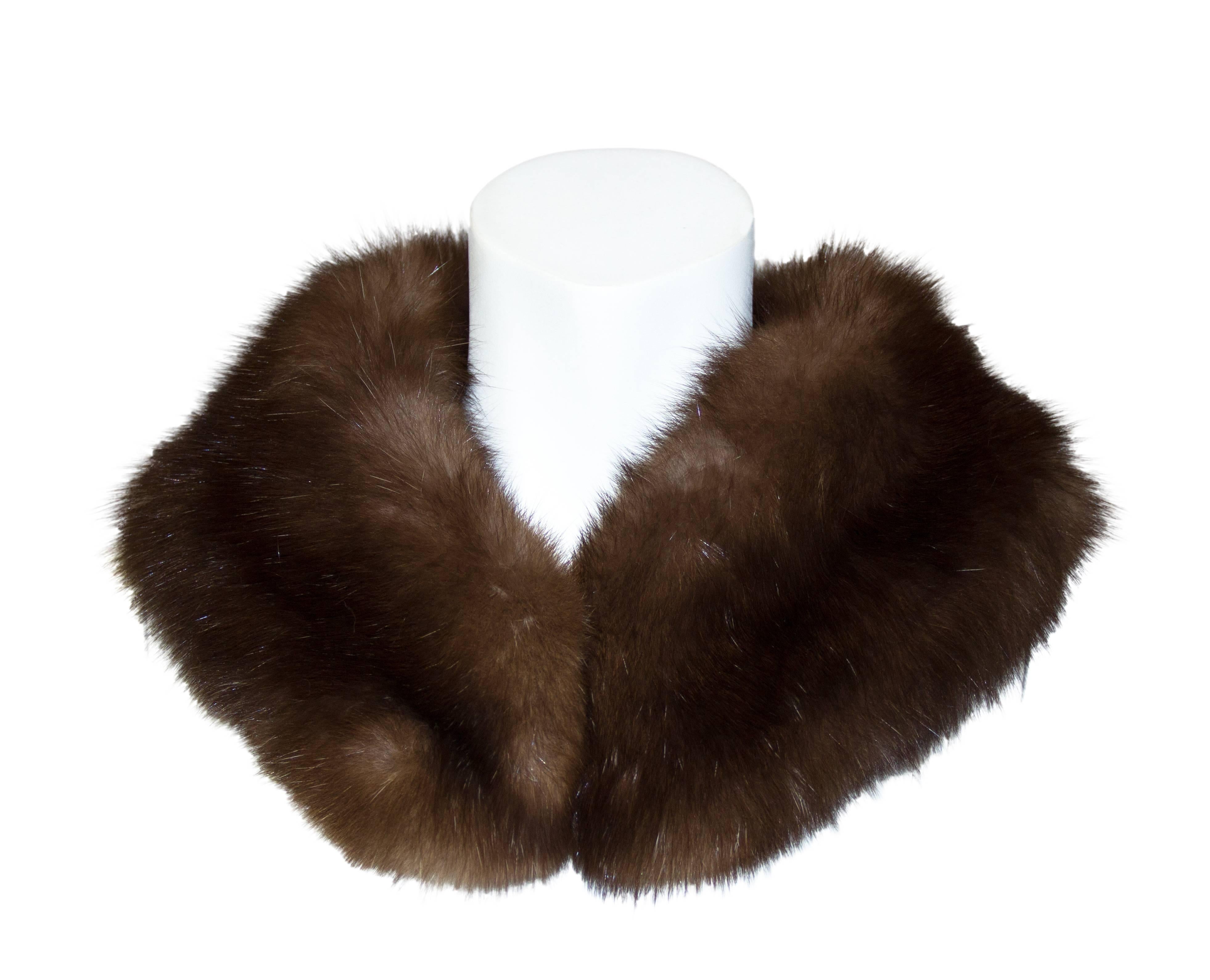 1960s single row sable stand-up collar. Interior fur hook and eye. Interior finished in velvet ribbon, monogrammed BCM. 