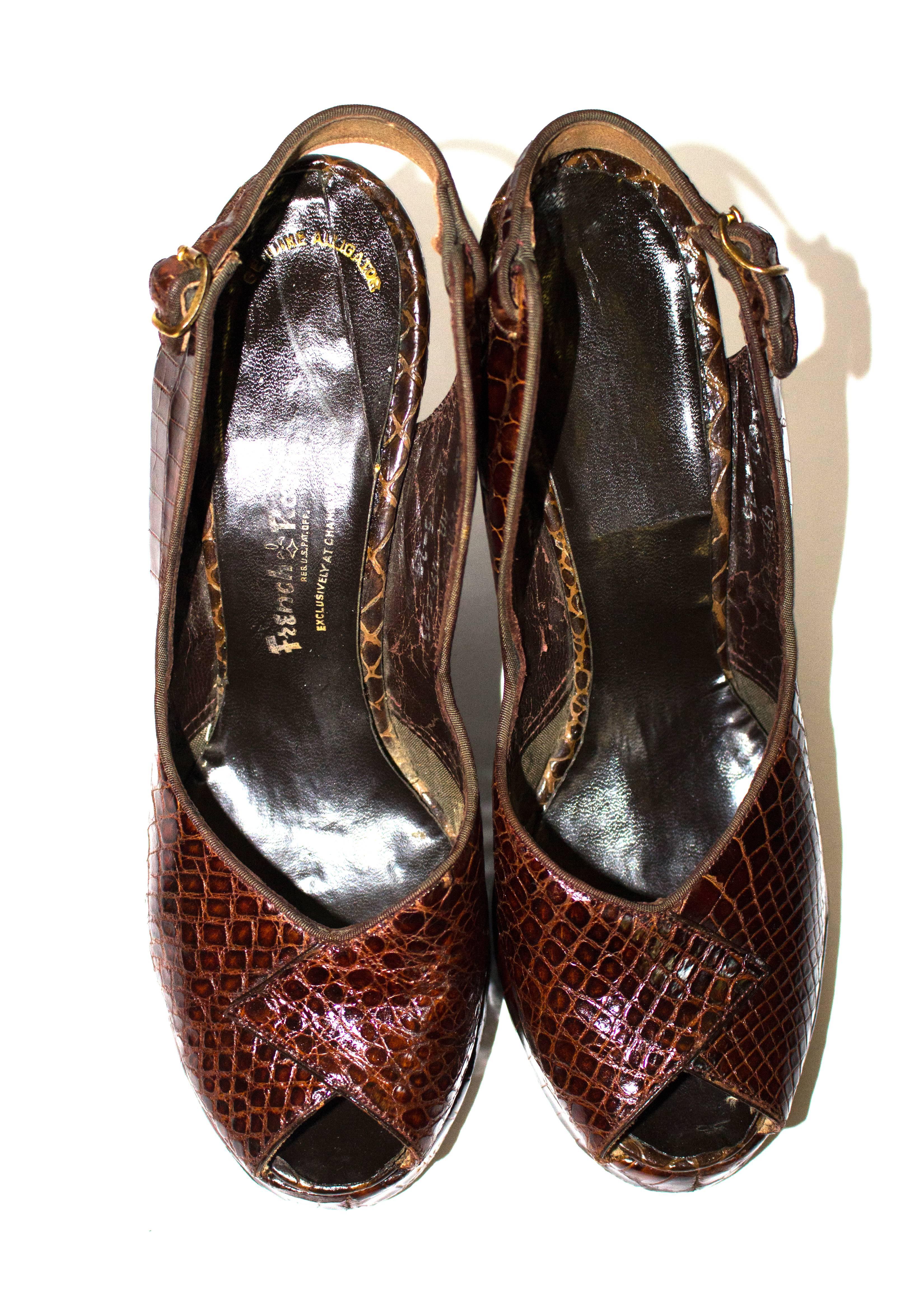 1940s alligator slingback platform heels. 

Heel height: 4"
Palm of foot: 3 1/4"
Insole: 9 1/4"