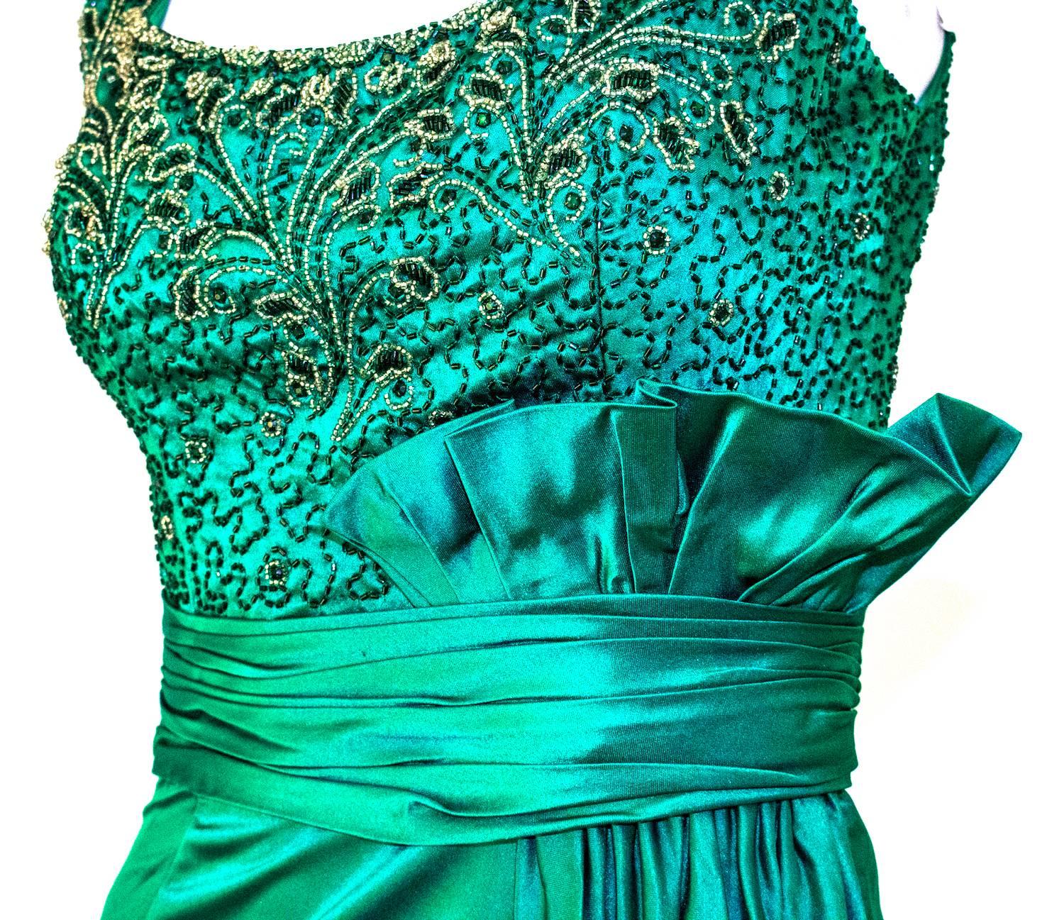 50s Green Satin Column Gown with Beaded Bodice and Gathered Waist Sash. Grecian-esque gathered skirt adornment. Metal zip up the back.