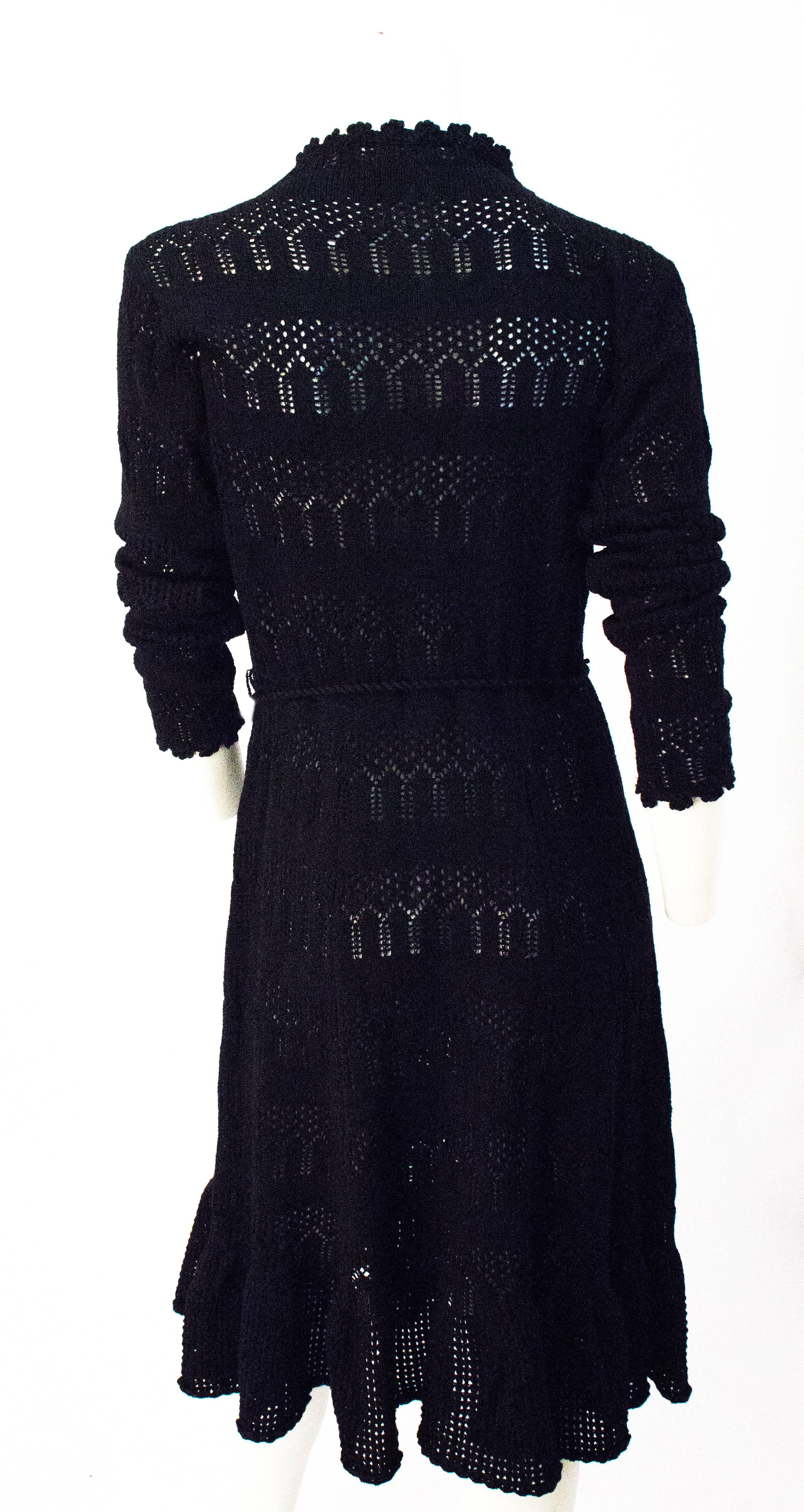 70s Black Crochet Long Sleeve Dress. Unlined. Original waist tie. 