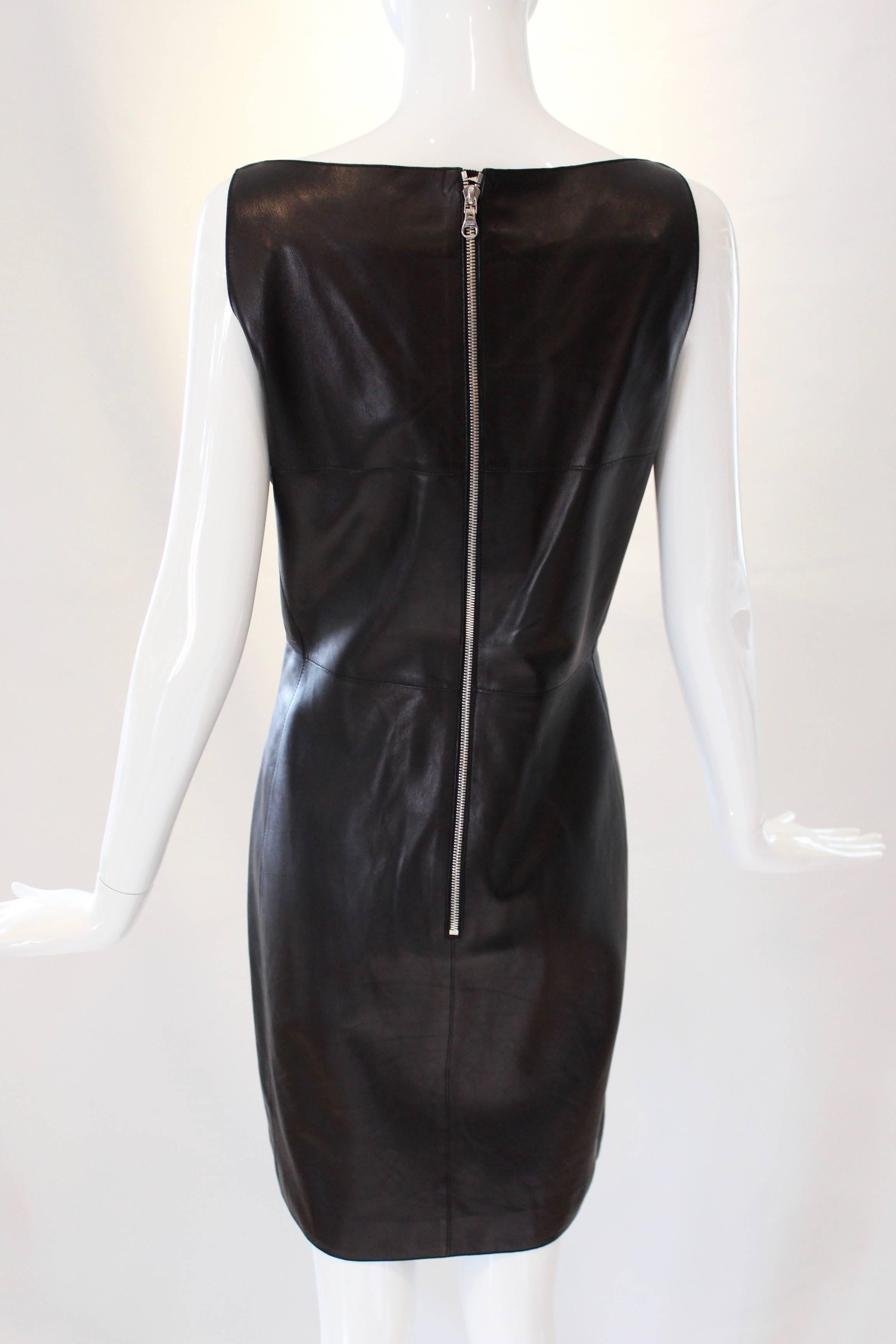 This Loewe Madrid Midi-Dress comes in a timeless feminine silhouette and is made up of the softest buttery black leather, which is exactly what this 19th-century Spanish fashion house is known for. An exposed silver zipper at the back gives a touch