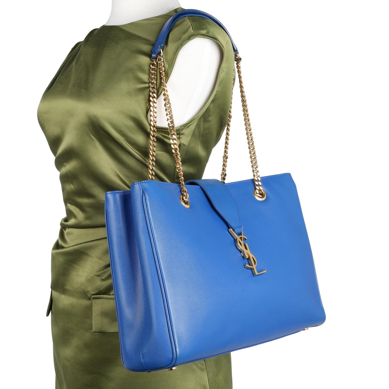 Authentic Saint Laurent YSL Large Cassandre Shopper in Blue.

Experience timeless style with the authentic Saint Laurent shopping bag in blue.  Features blue leather, gold-tone chain shoulder straps with leather shoulder strap that offers comfort