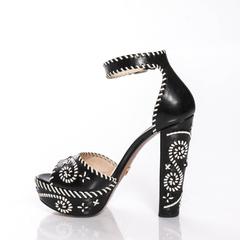 Pair of Prada black and white whipstitch leather platform sandals