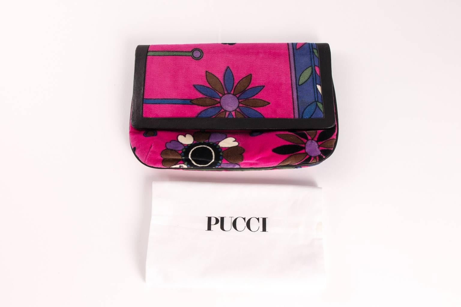 funky finders is pleased to debut this treasure from our renowned vintage Pucci archive. rare circa 60's Pucci velvet clutch featuring a brilliant Mid-Century signed floral motif. black leather trim & piping are notable. fine style from the