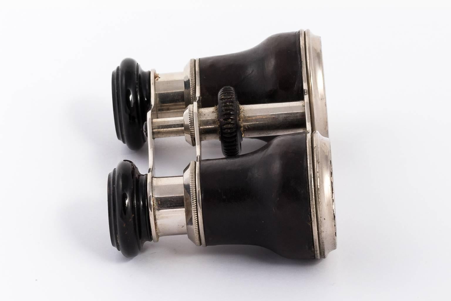 Black Circa early 20th century Leather bound opera glasses. For Sale