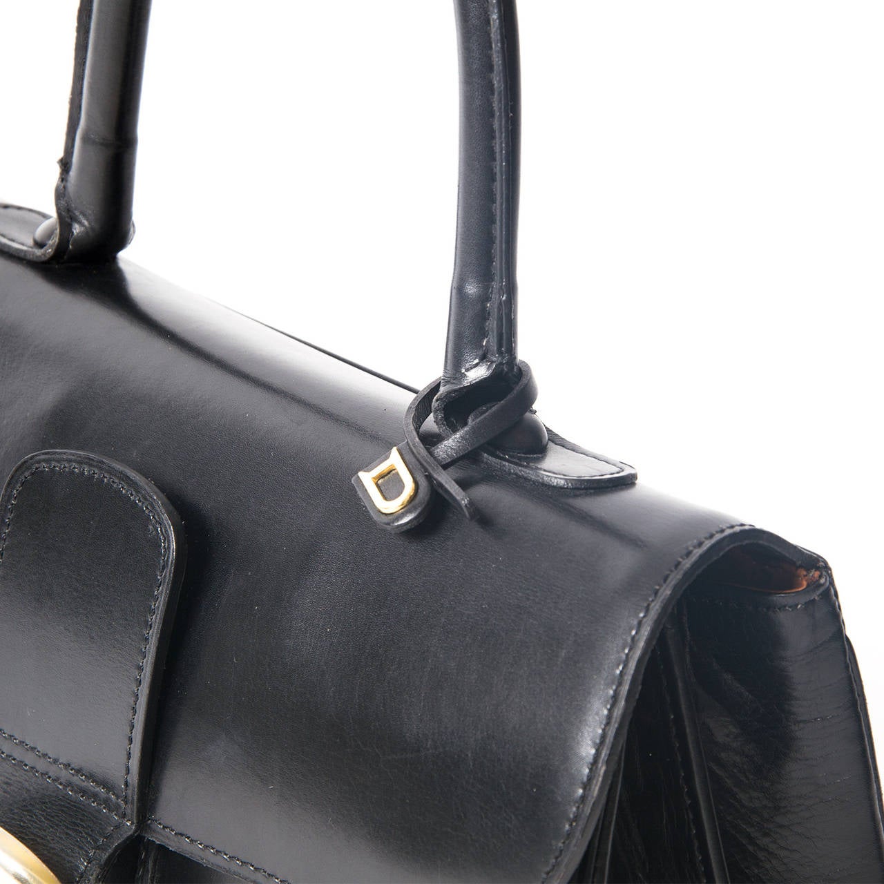 Delvaux black Brillant in soft calfskin with golden hardware.  
This classic Brillant from premium Belgium luxury leather goods brand Delvaux excels in both style and quality. Featured in classic black, this piece is a versatile option for any