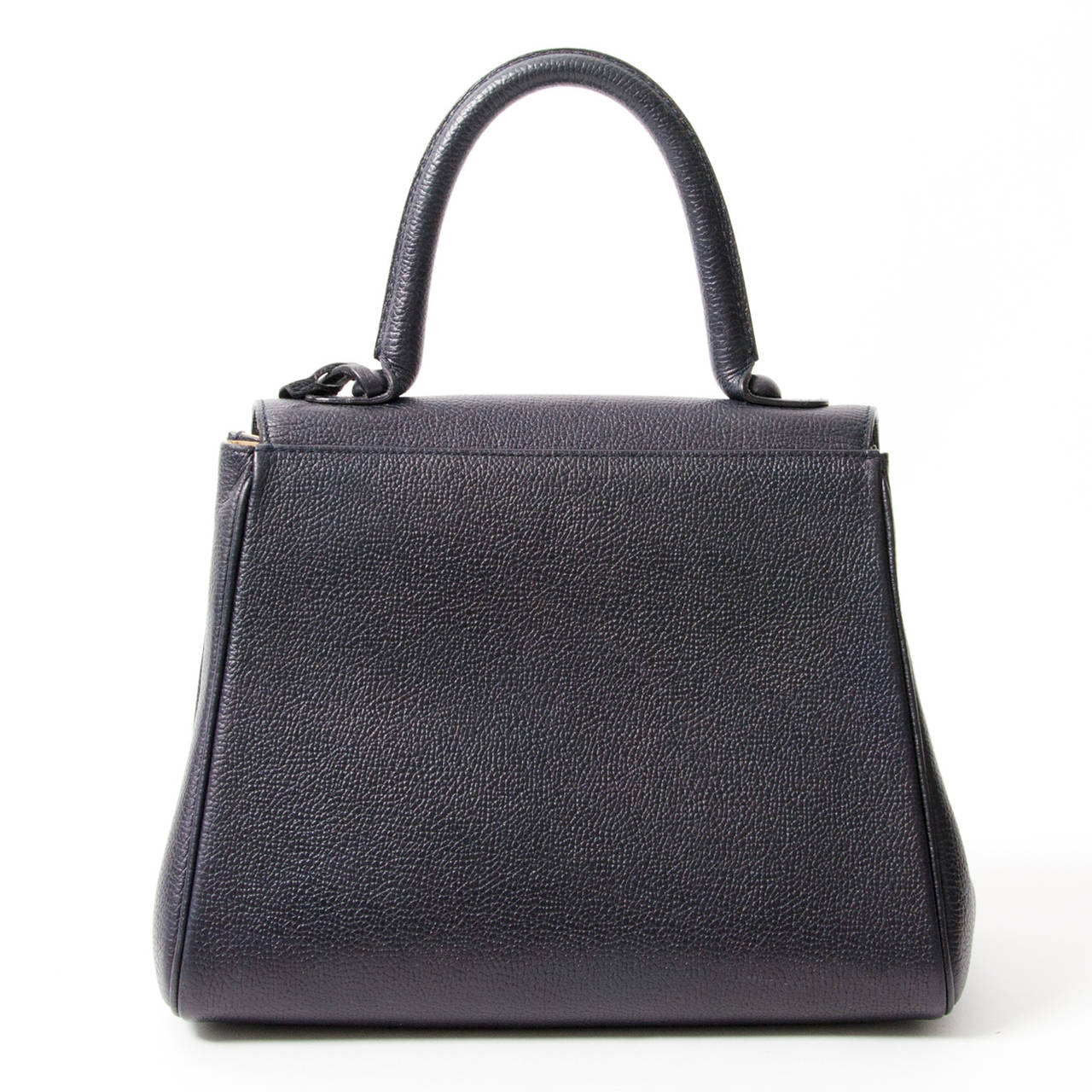 This classic satchel from premium Belgium luxury leather goods brand Delvaux excels in both style and quality. This navy blue MM Brillant is the essence of class and femininity. The top handle ensures comfortable and elegant use. Gold hardware