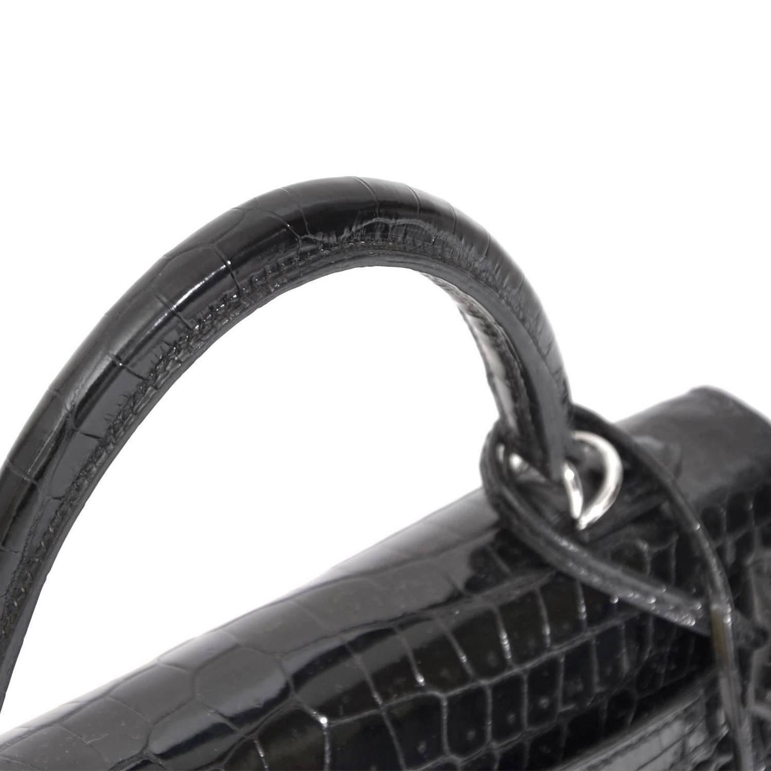 Super rare! This is a 25cm Black Crocodile Porosus Hermes Birkin bag. The bag contrast beautiful with its palladium hardware.
The plastic remains on the hardware and the bag is in new condition inside and out.
It will come in its Hermes sleeper with