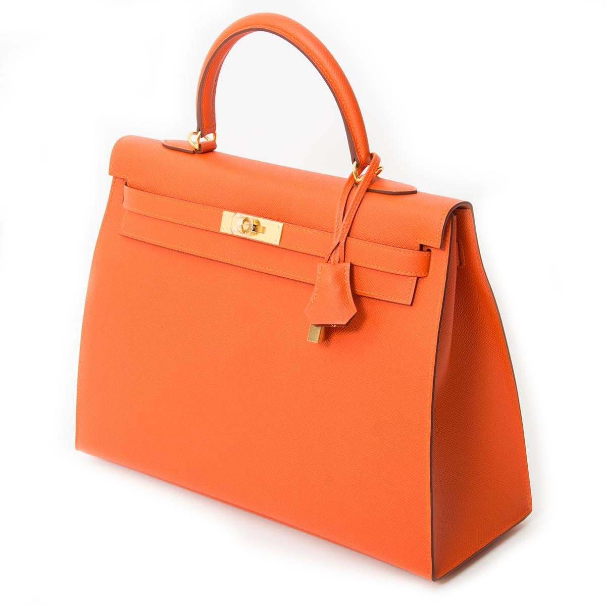 Hermès Kelly 35 Epsom  in Feu Orange,a bright orange color, it is brighter and sharper than the classic Hermes orange.

This compressed type of epsom leather holds true to its shape in all instances and is completely resilient to scratches. This