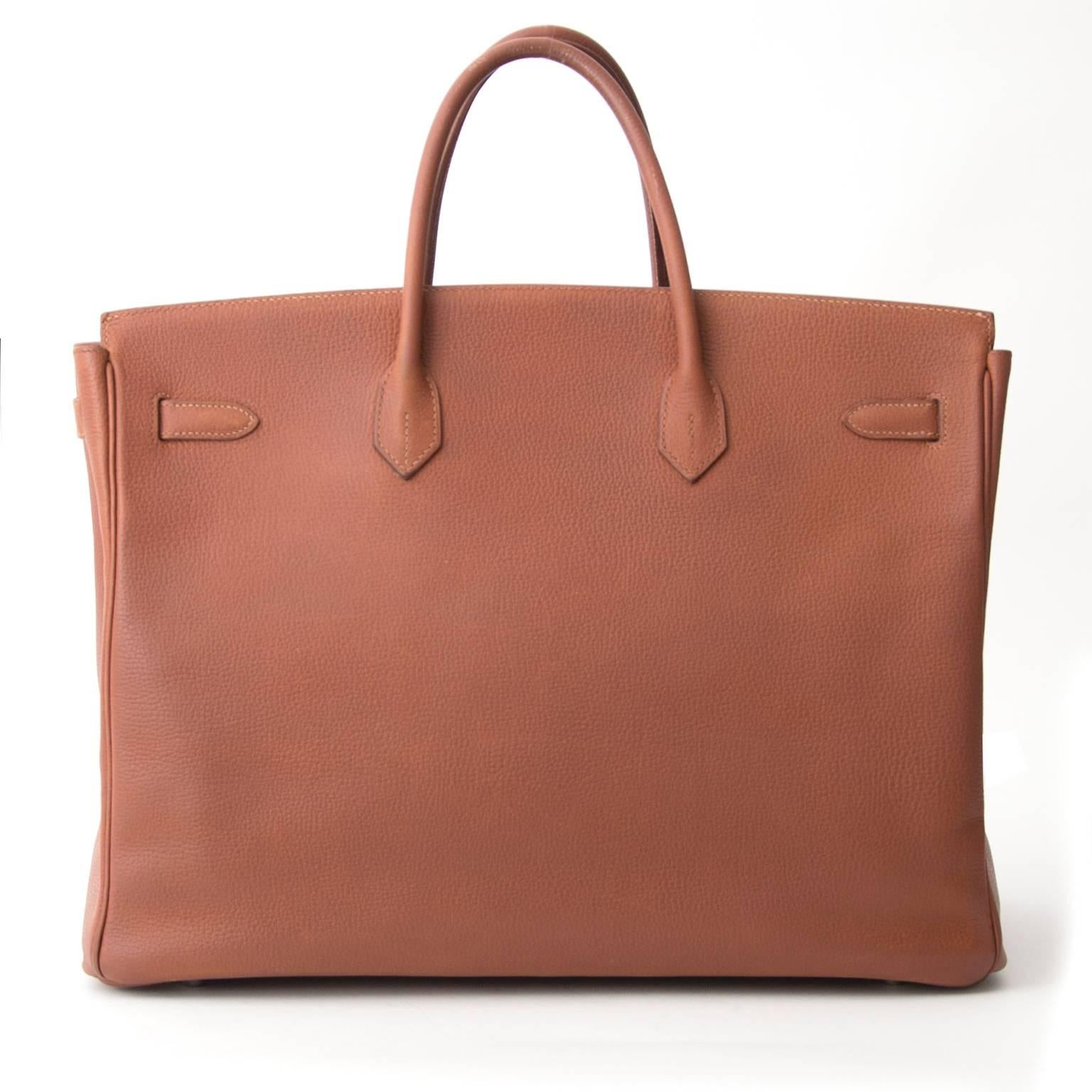Hermes Birkin Marron Veau Fjord.

Fjord leather, is known for its fair softness and matte texture and has a high water resistance. The Hermes Birkin is now the symbol of class and fashion. Its highly recognizable design makes it a staple of the