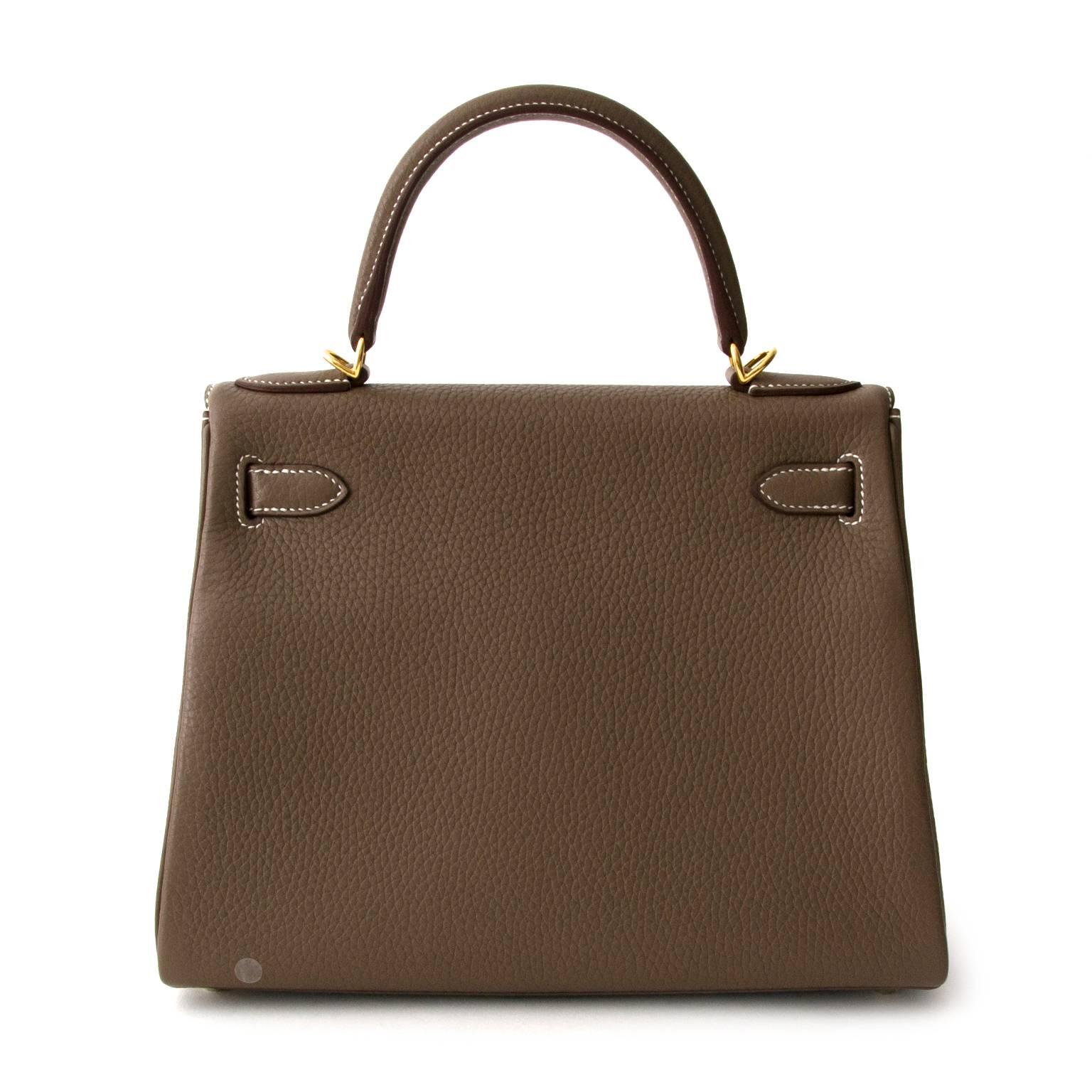 Brand New Hermès Kelly Retourne 28 Clemence Taurillon
This BRAND NEW Kelly bag is the proof of the craftsmanship of the house of Hermès.
This beauty has never been worn, The protective plastic is still in place on the hardware.

Comes with

