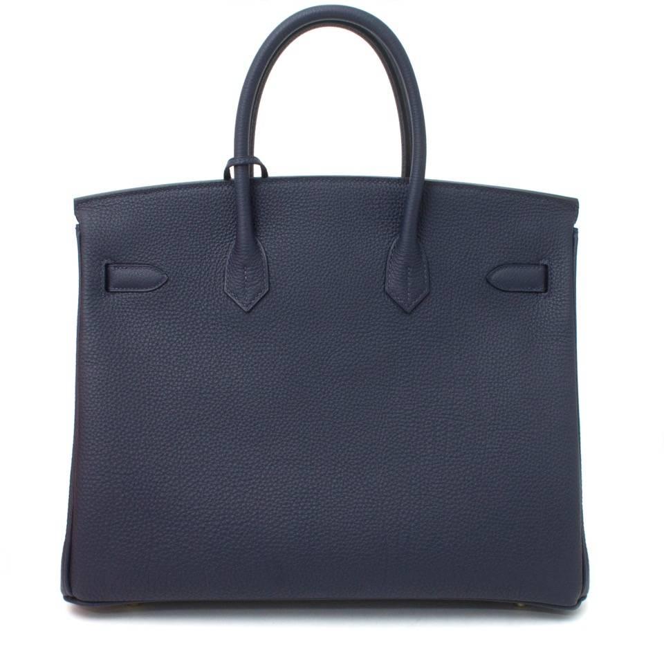 Hermès Birkin bag in soft and smooth Togo leather. The Blue Nuit color and gold hardware make each other pop!
Exquisite new color Blue Nuit or midnight blue, a deep, rich dark blue hue.  (new color from 2015-2016 collection).

BRAND NEW. NEVER