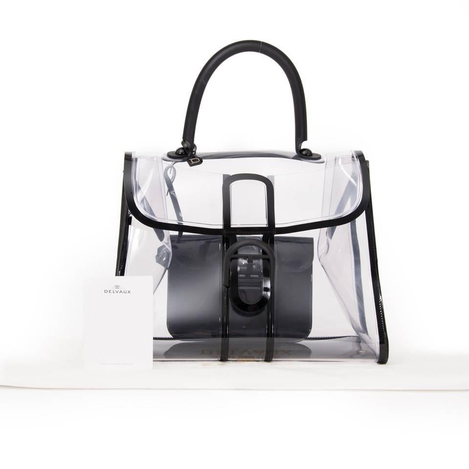 A real collector's item This updated version of the classic Brillang bag Delvaux Xray Brillant.
See-through PVC is one of fashion’s most daring (and impractical) trends. 

Excellent condition, never used.
Comes with receipt