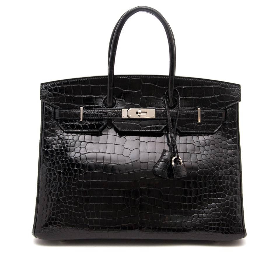 This stunning and rare Hermès Birkin 35 cm crocodile porous black PHW.

This bag is in almost perfect mint condition.

Crocodile porous is the most luxurious crocodile to obtain from Hermès.

This is an extreme VIP bag in terms of skin quality and