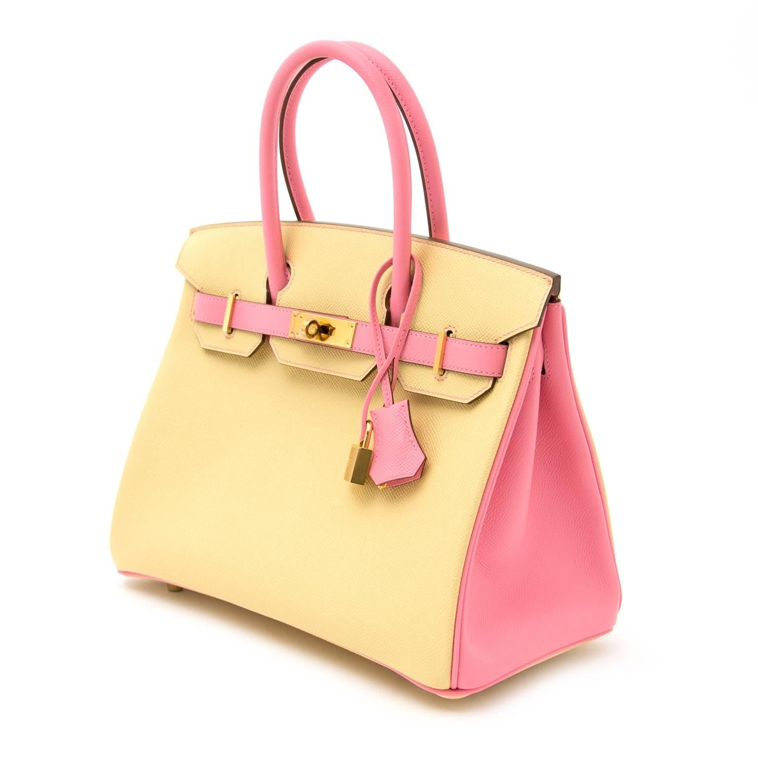 Highly Collectible Brand New Hermès Bicolor Birkin 30 Epsom Jaune Poussin And Rose Confetti with contrasting gold tone hardware.
While all Birkins and Kellys are very hard to secure, this distinctive version is incredibly rare in multiple ways