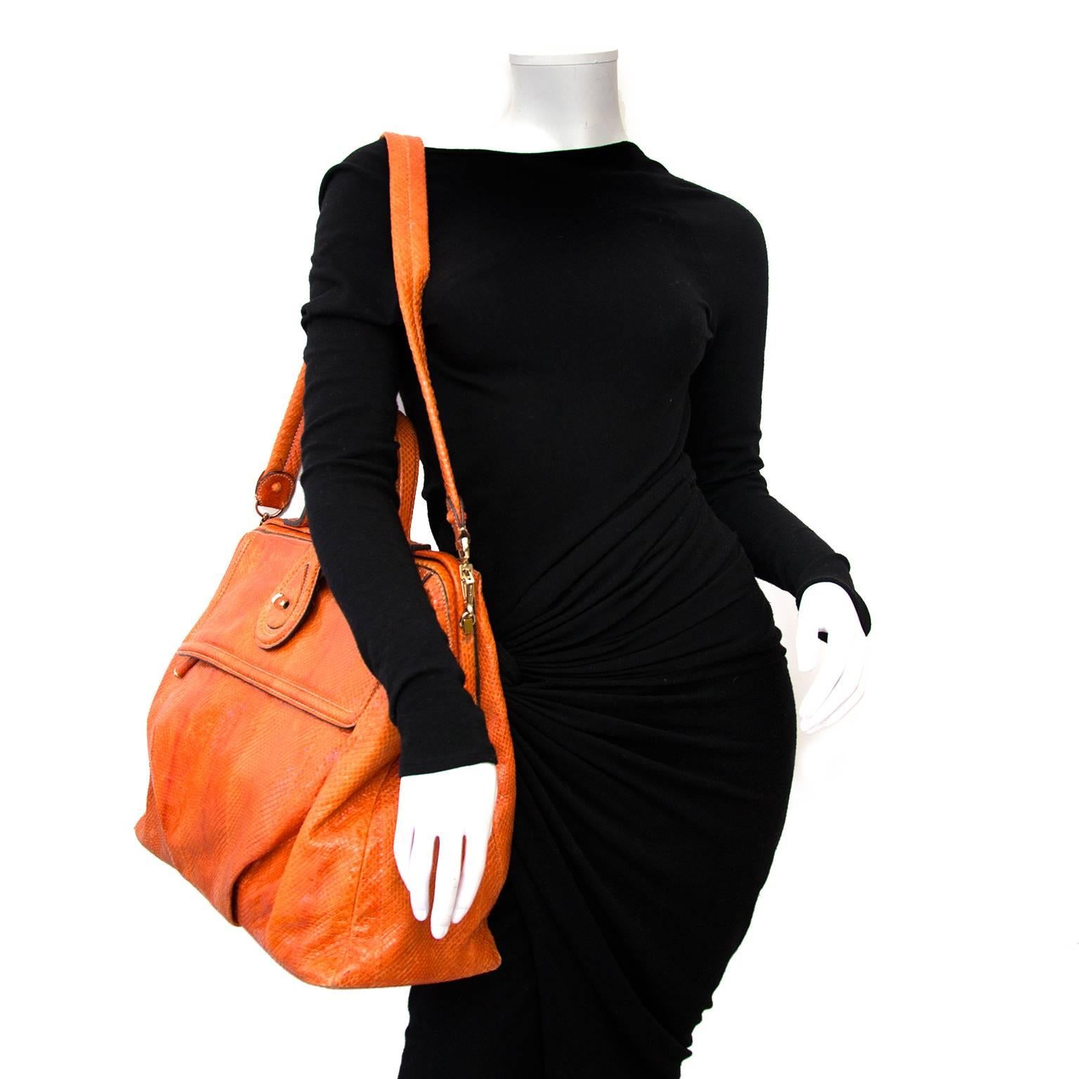 Zagliani Orange Python Large Hobo Bag

ZIconic Puffy Zagliani hobo bag in a extra large size.  Volluminous shape that can carry all the day’s essentials. One top handles. Two compartments and twist lock closure. Internal zip pocket and two pouch