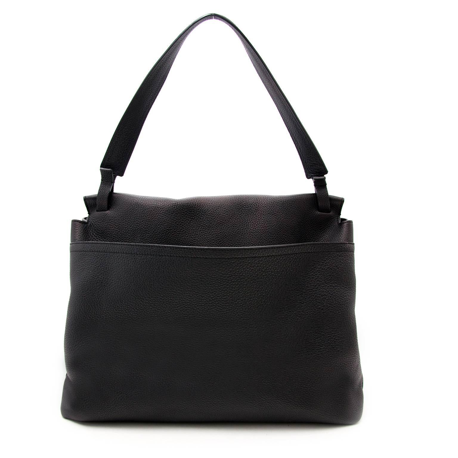 

The Row Black Leather Tote

The Row's tote bag is a luxe staple that promises to prove an envy-inducing mainstay for many seasons to come.
The beautiful leather features a roomy interior that's ideal for carrying all of your essentials. 