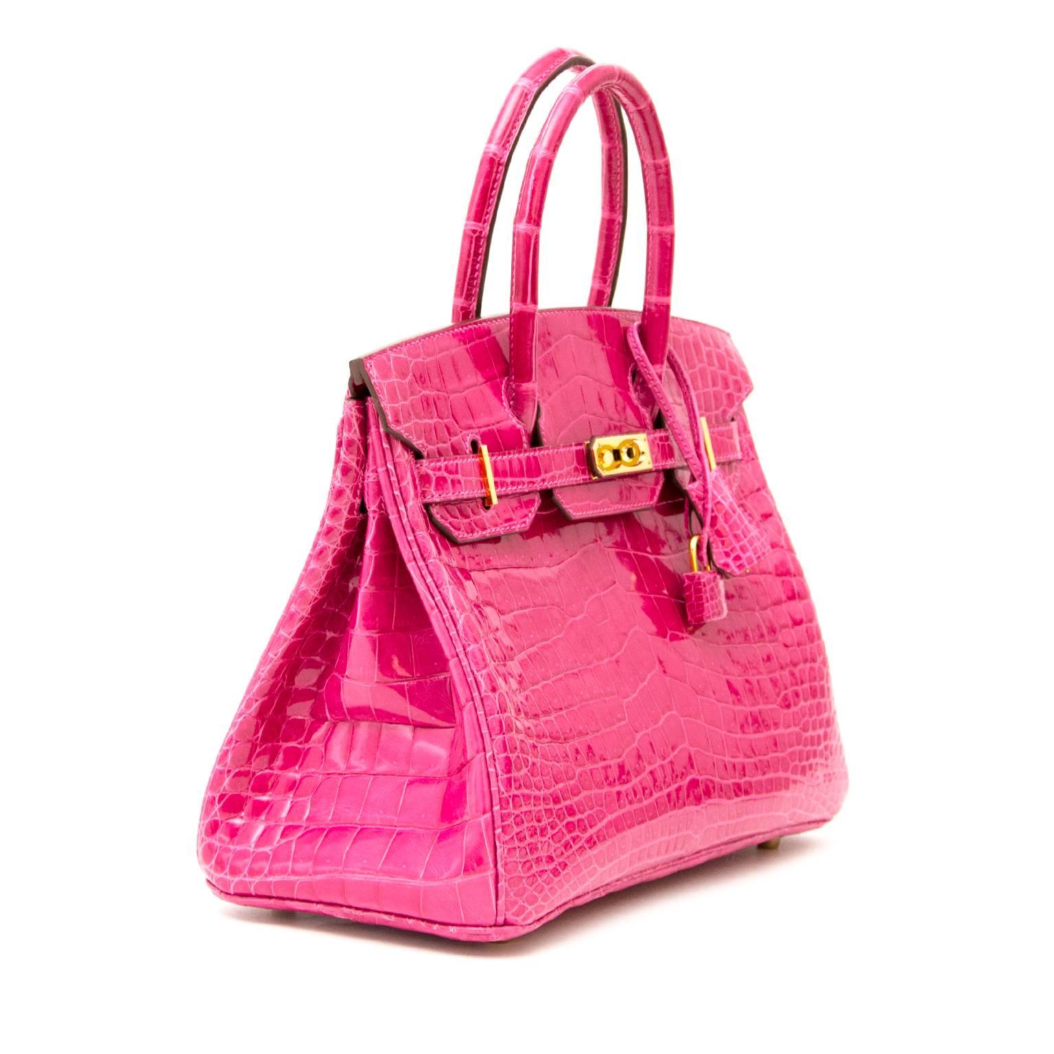 VERY GOOD CONDITION

Hermès Birkin 30 Rose Fuschia Croco Lisse GHW

Turn heads, make waves, carrying this bag will make you feel on top of the world! This gorgeous hard to find Hermes Birin 30 Rose Fuschia Croco Lisse GHW is one of the most coveted