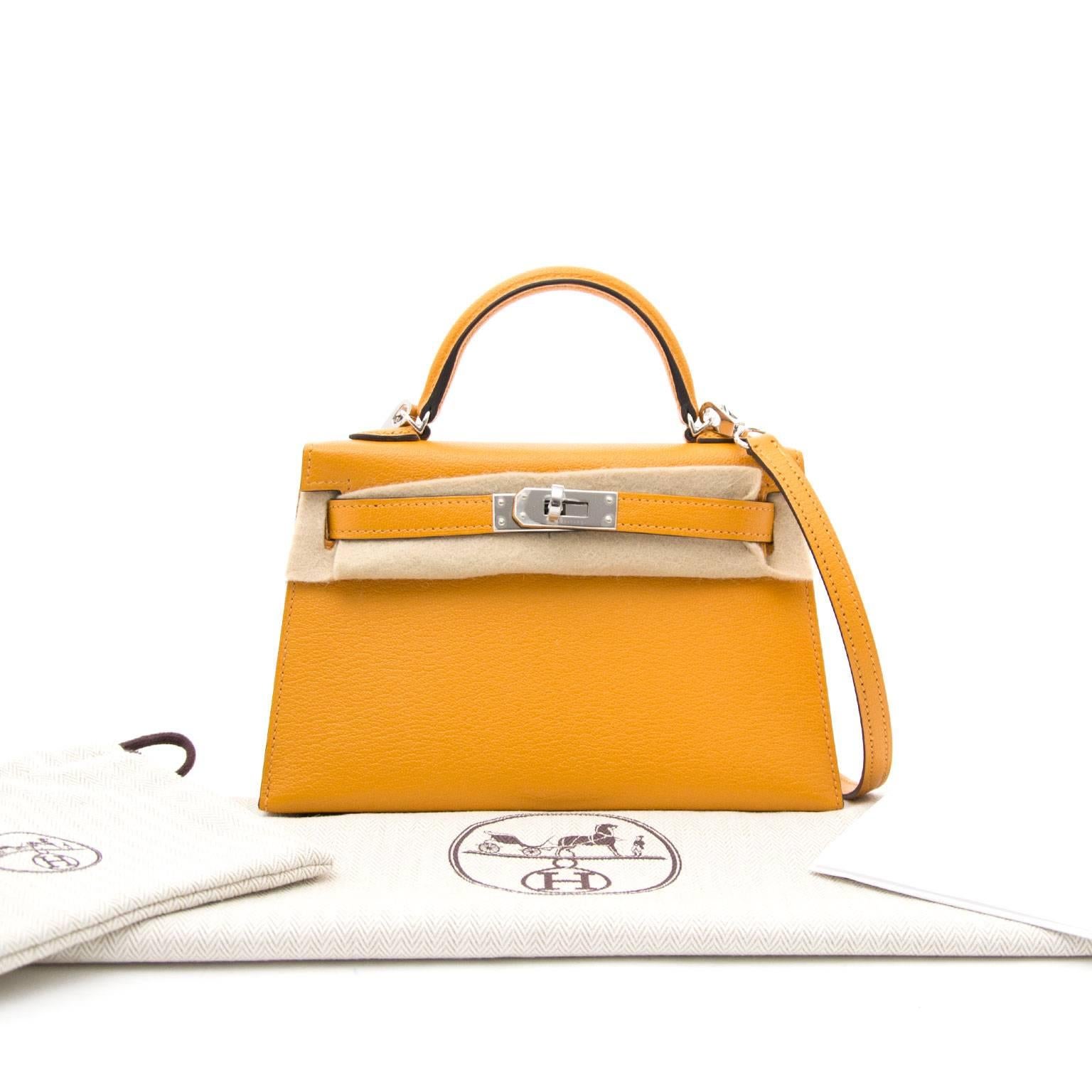 Brand New Hermes Mini Kelly Moutarde

Everybody loves the Kelly by Hermes and this mini model will definitely take your breath away.
It's been made to fit al our modern contraptions, smart phones included.

This almost impossible to find Mini Kelly