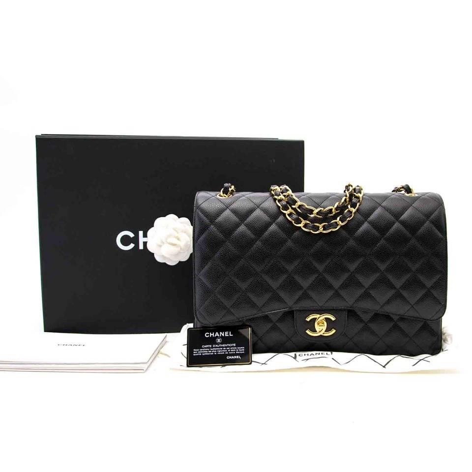 Chanel Black Maxi Caviar Classic Double Flap Bag  In Excellent Condition In Antwerp, BE