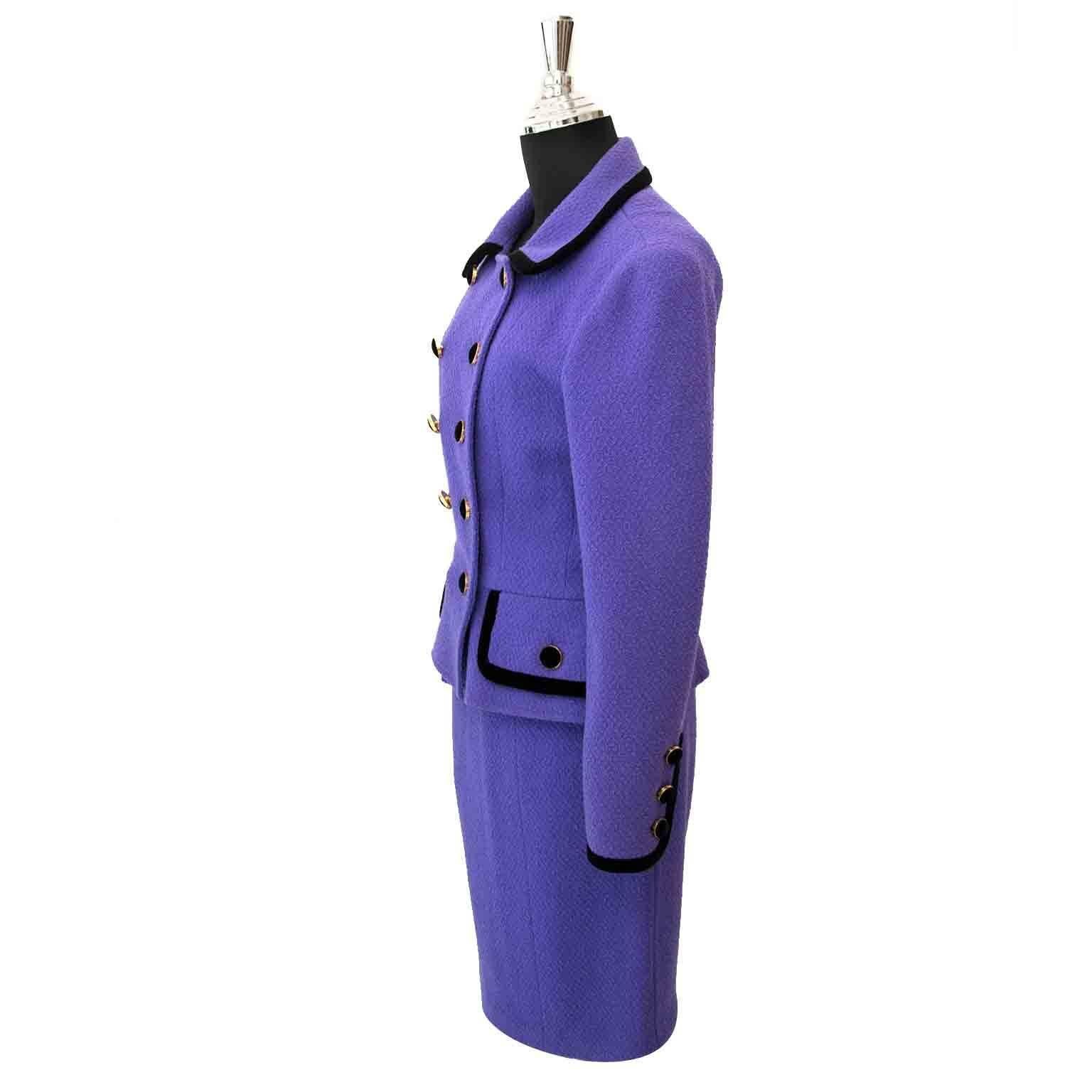 

Chanel Purple Tailleur Set

This classy 'deux-pièce' Chanel comes in a bright purple color.
The fabric contains 99% wool and 1% nylon.

The blazer is finished with black velvet details on the buttons.

You can wear this as an ensemble or combine
