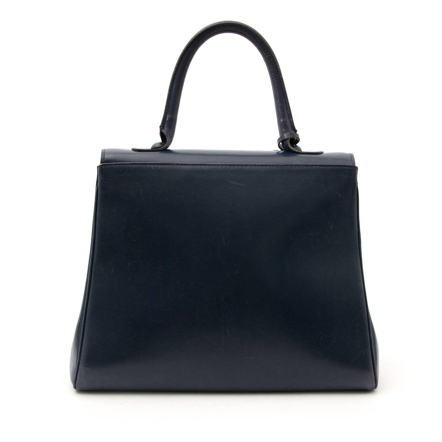 Good vintage condition

Delvaux Blue Brillant MM Bag

The Brillant is one of Delvaux's most celebrated bags.
The medium size makes this bag the perfect every day carry-on.
Fit all your essentials in this beautiful bag and close securely this bag