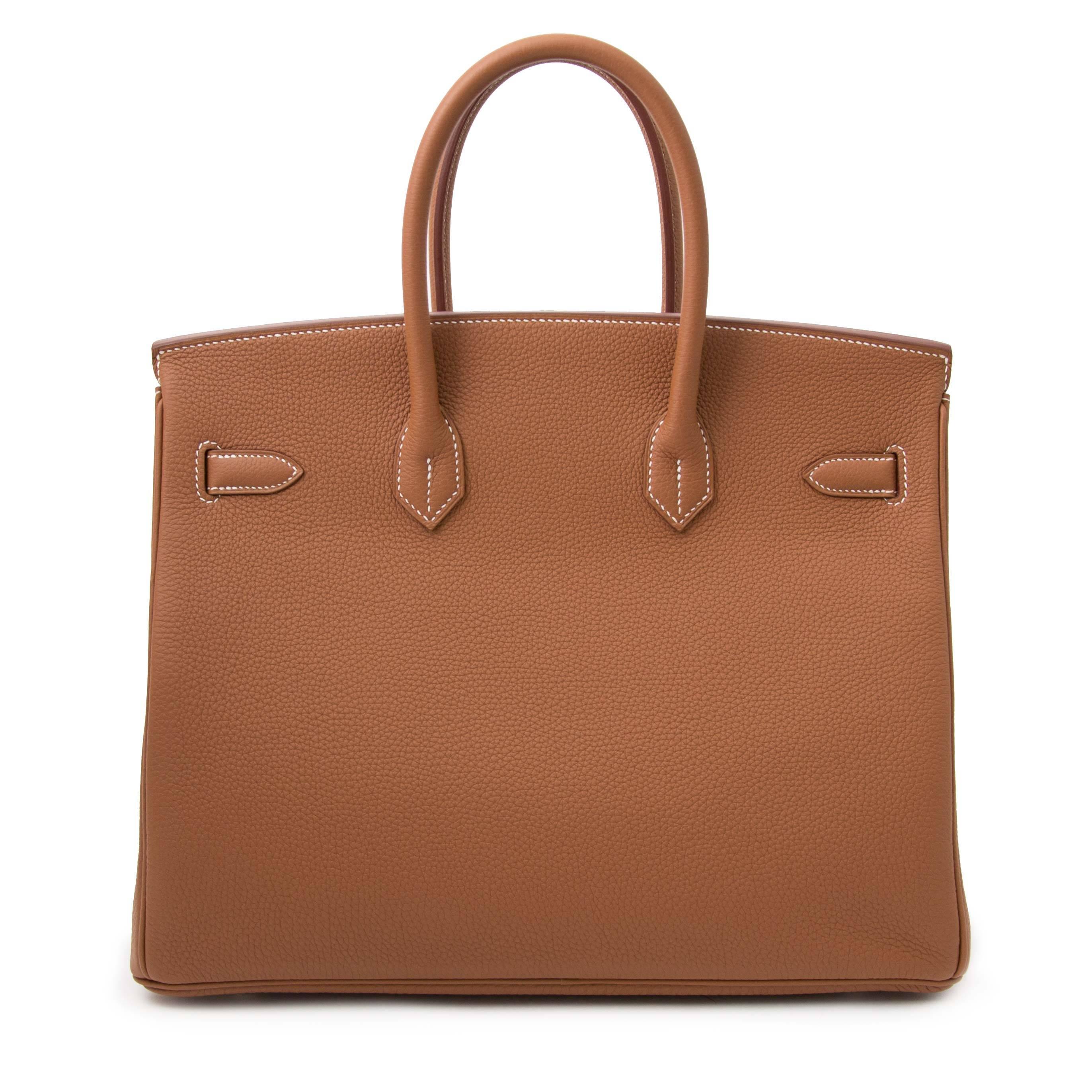 'Gold' is one of Hermès classiest and timeless color. It goes with everything as it's perfect neutral color.
The bag is made out of smooth togo leather and is accentuated with palladium hardware. 
Treat yourself with this beautiful Birkin and get