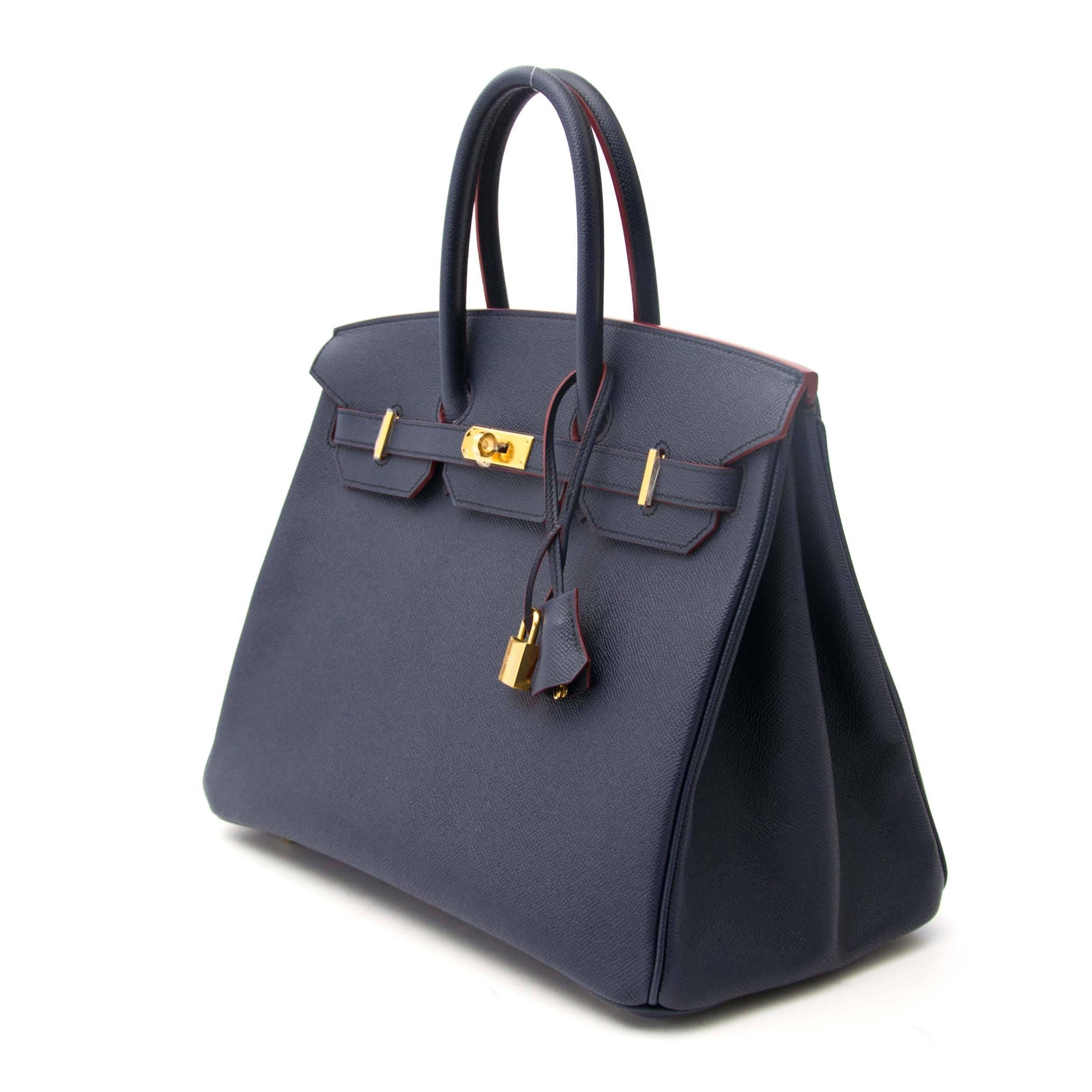 Never Used

Never Used Hermes Birkin Blue Indigo Contour

Hermes Limited contour Blue Indigo Birkin 35 made out of epsom leather with Rouge H contour and silver hardware.
At first sight it looks no different from a standard Birkin bag however closer