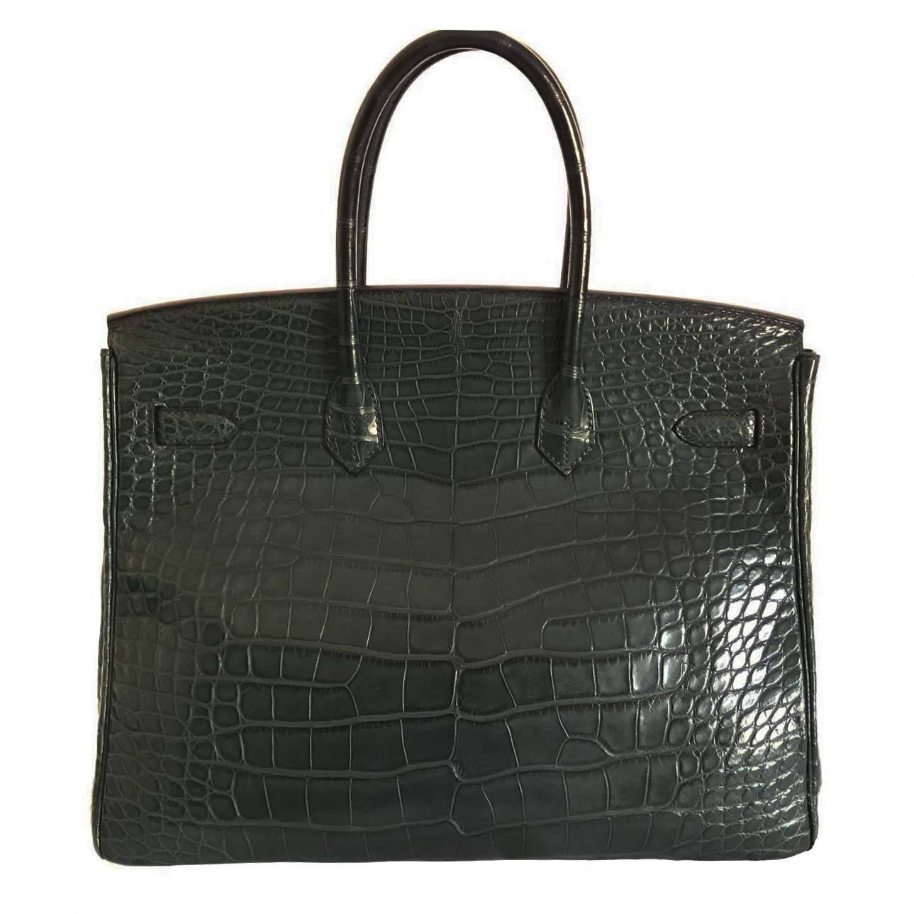 Very Rare Hermes Birkin 35 Alligator Vert Titien PHW
Comes with invoice and cites. This extremely rare and highly coveted bag comes in a good preloved condition. 