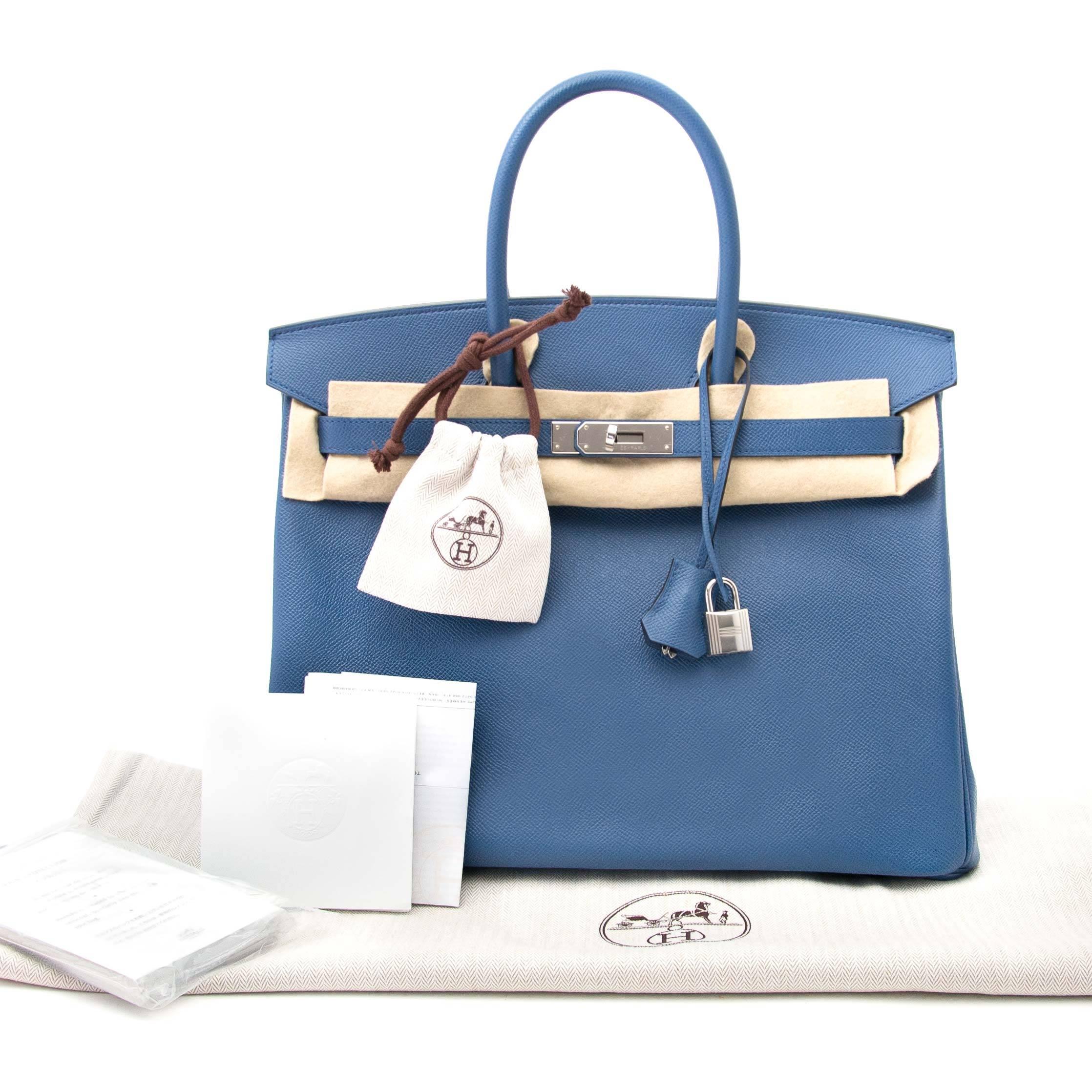 This Hermes Birkin 35 Epsom comes in the color Bleu Agate which is a soft shade of blue, bright yet subtle. The palladium hardware emphasizes the timeless Bleu Agate Epsom leather body. This embossed type of leather holds its shape in all