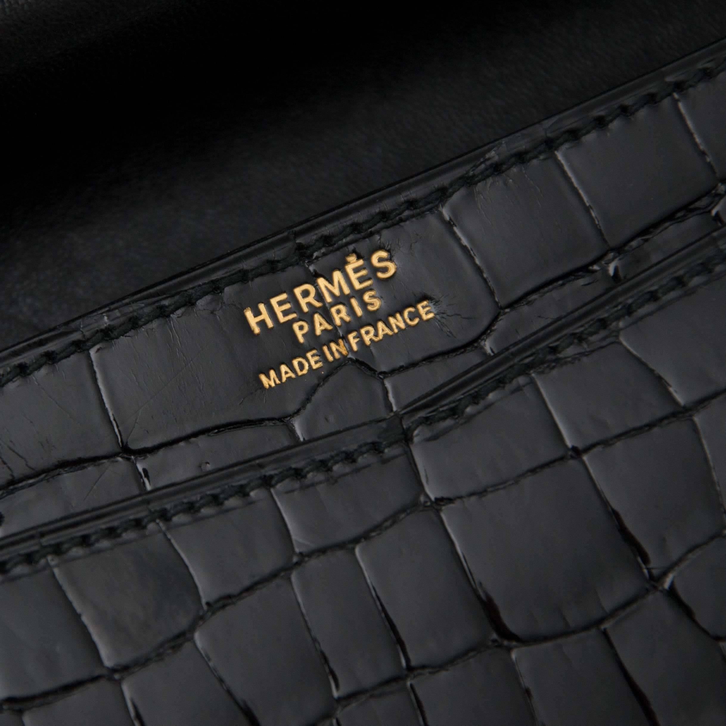  Hermès - Sac à bandoulière « Sac Ring » vintage en croco noir  Unisexe 