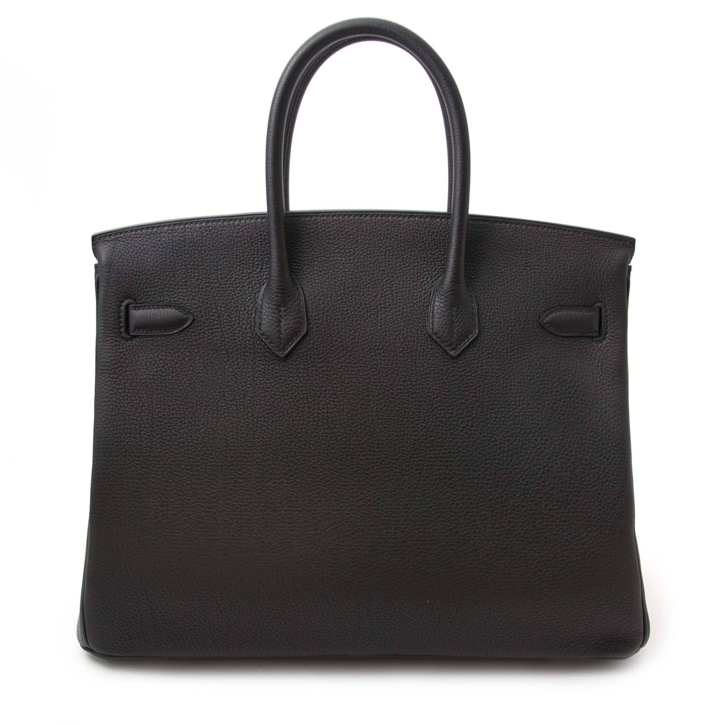 Never Used, comes with full set.

Hermes Birkin 35 Black Togo GHW

This iconic Hermes Birkin 35 Togo bag can be yours, right now! This -inspired by Jane Birkin- bag is made out of the highest scratch-resistant quality leather and features timeless
