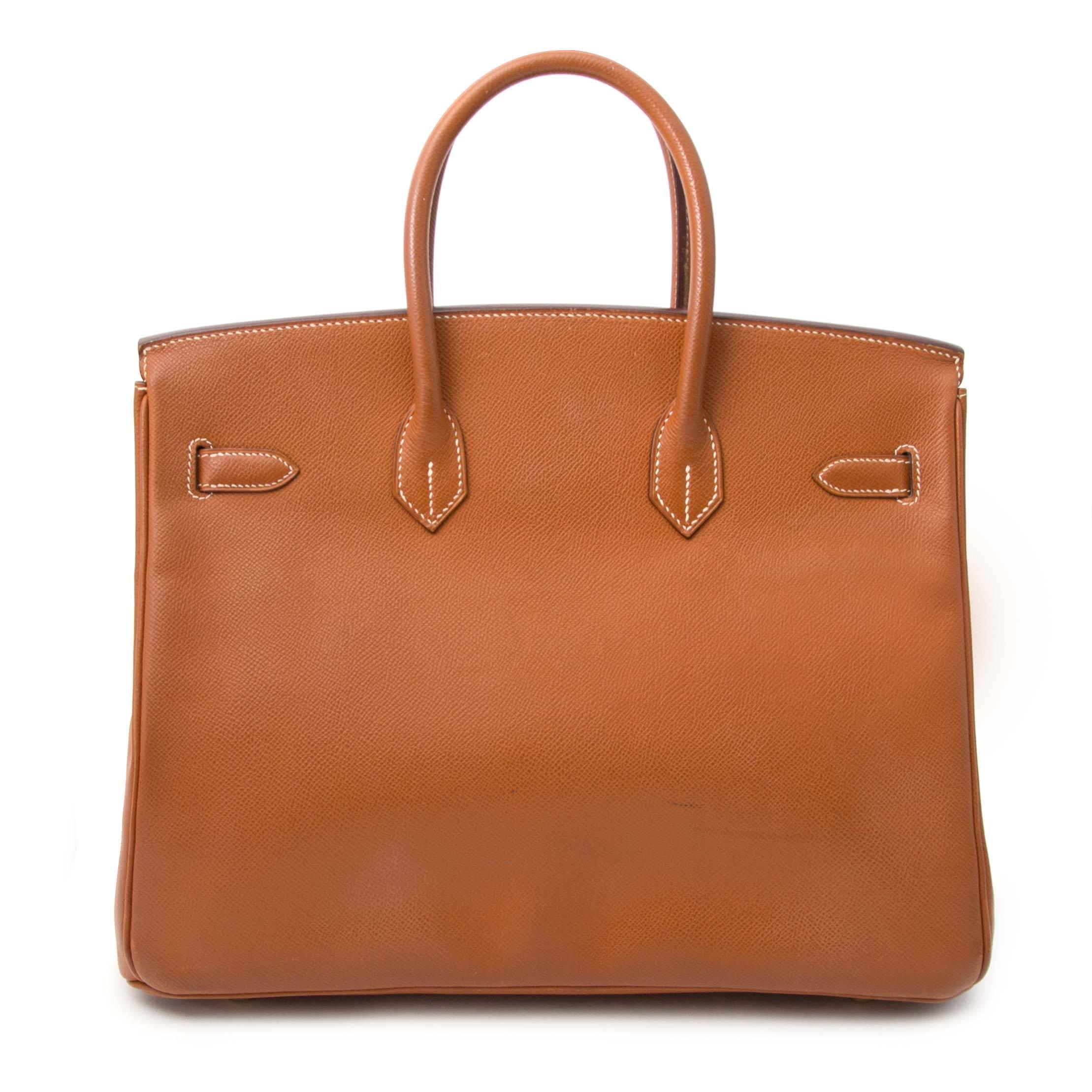 This timeless Birkin bag comes in a gold cuir courchevel leather featuring gold toned hardware, which matches perfect.

Cuir courchevel is a structured embossed leather type that hold its shape very well!

 

 

Comes with

    Original box
   