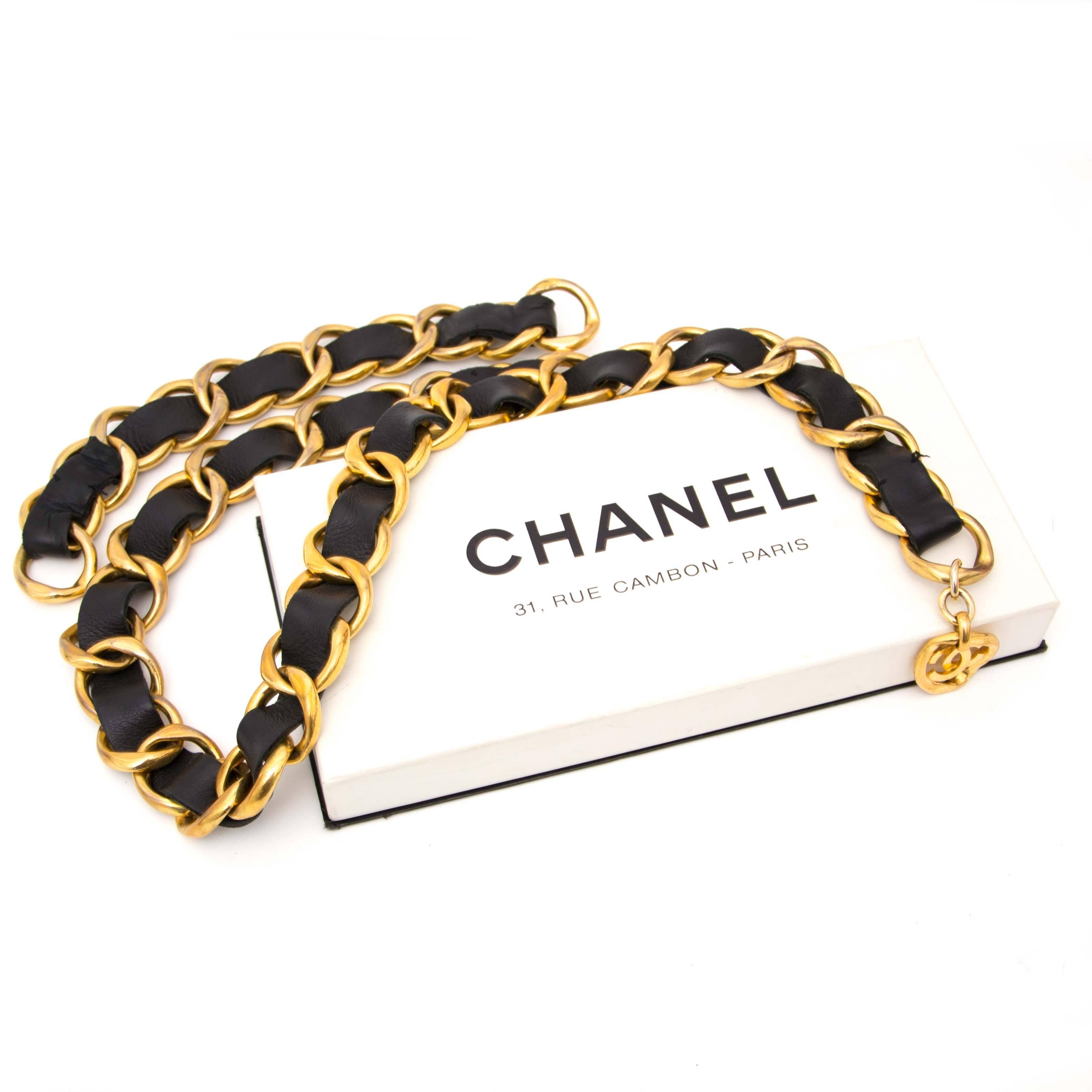 Chanel Black Vintage Leather Weave Swag Belt

 This fabulous black Chanel weave belt is made out of gold toned oval links featuring black leather treads. The long leather weave hanging section hooks onto the lower level of the belt to create a swag