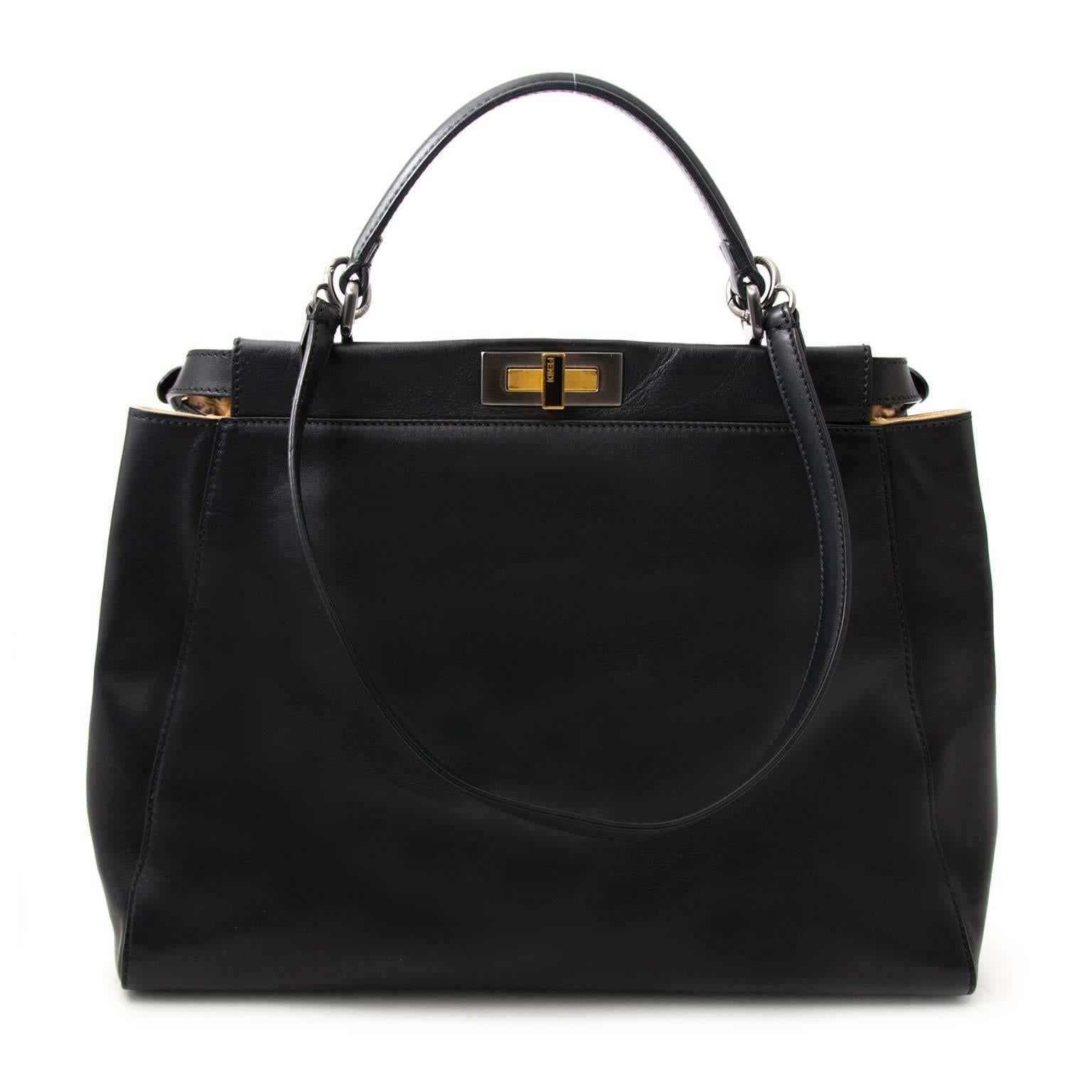 
Fendi Black Leopard-Lined Peekaboo Large Bag

Stand out from the rest with this eyecatching 