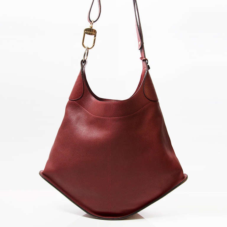 Delvaux Bag in bordeaux grained leather. With gold hardware.