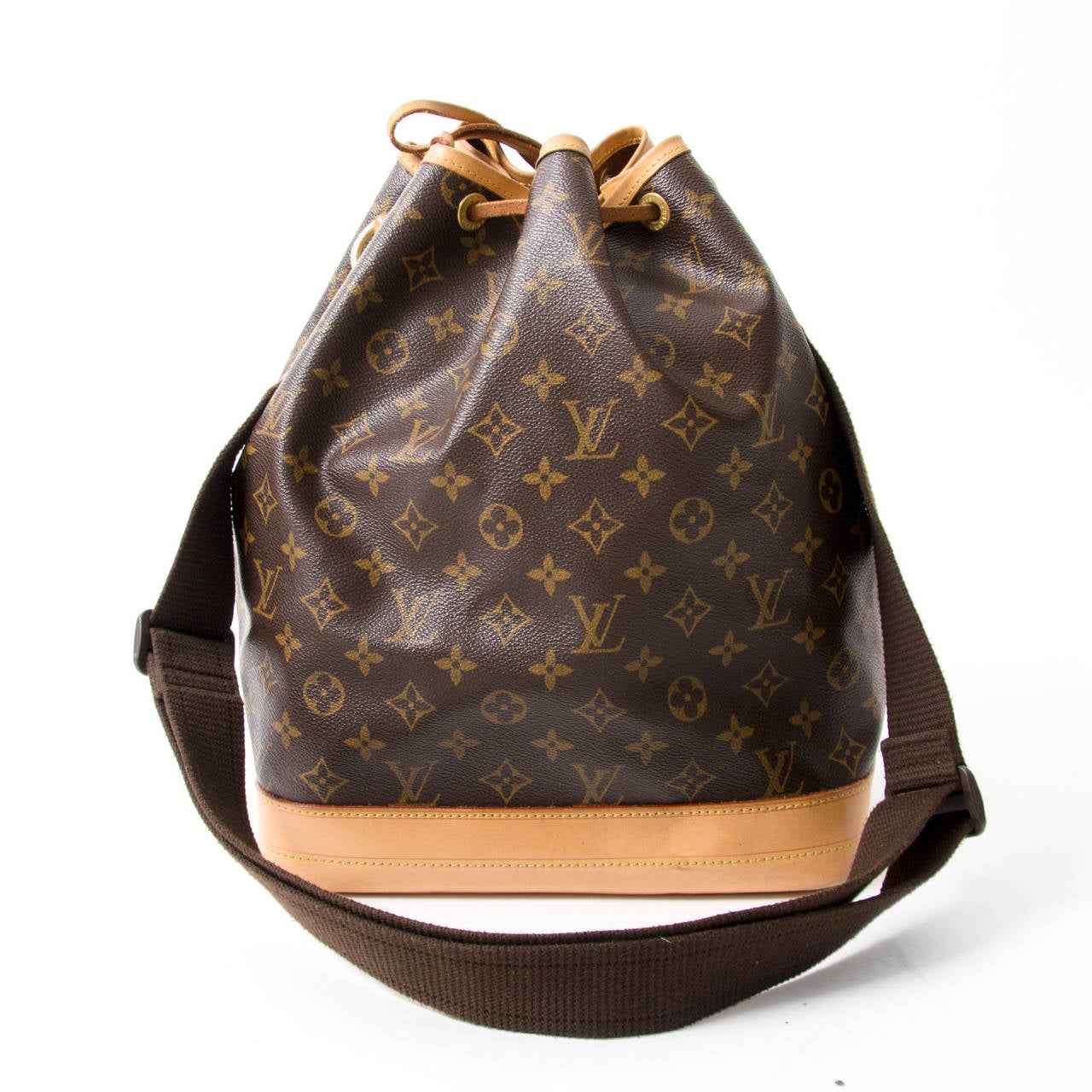 Asked by a Champagne producer to develop a sturdy, stylish bag in which he could transport five bottles of bubbly, Gaston-Louis Vuitton created the classic Noé design. That was in 1932. Shown here in signature Monogram canvas. 

- Signature