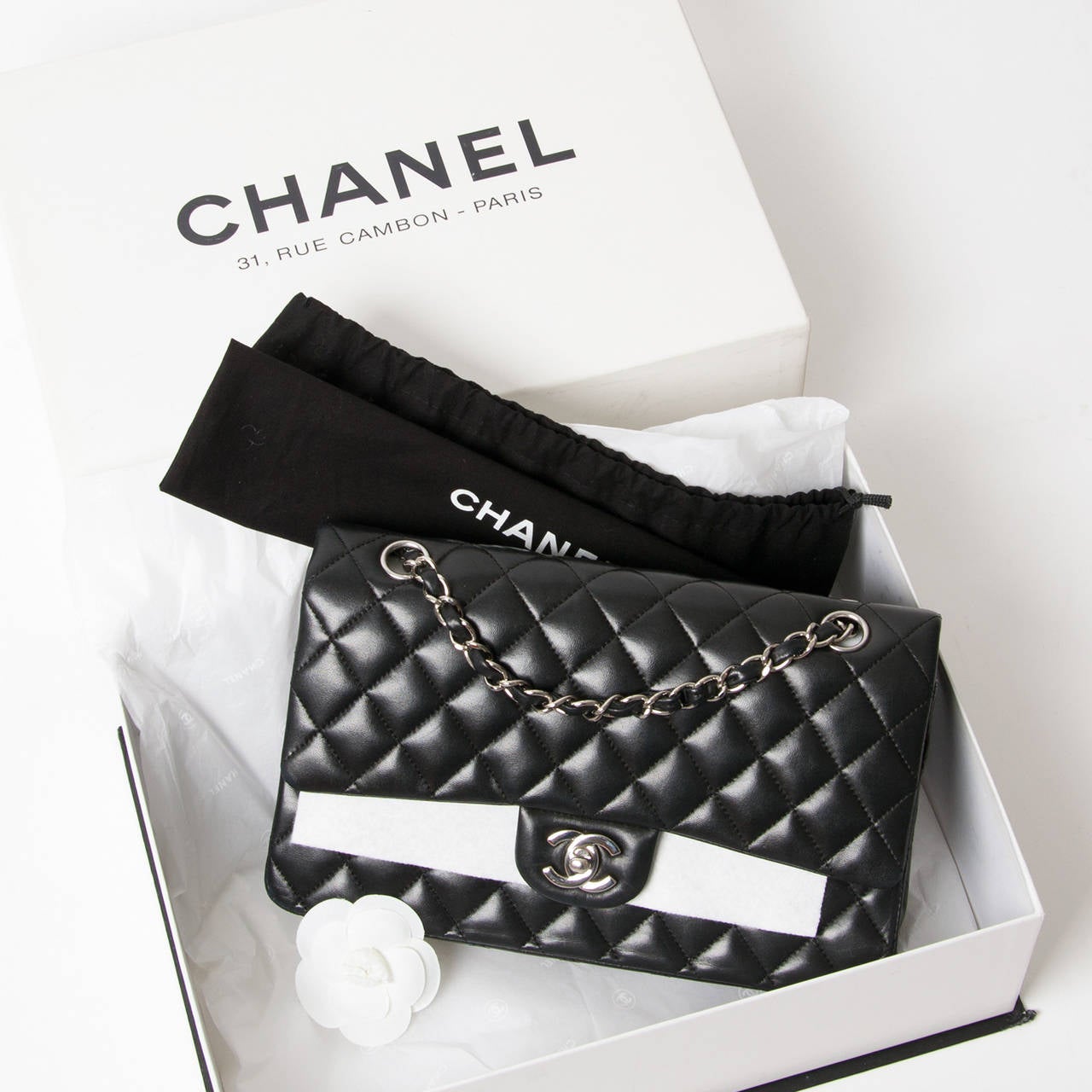 Chanel Black Lambskin Medium Classic Flap Bag

This iconic bag is considered to be one of the most classically beautiful bags to wear today.

This black medium classic flap bag is crafted in soft black diamond quilted lambskin leather. The bag