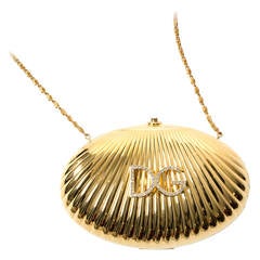 Dolce und Gabbana Goldene Shell-Clutch