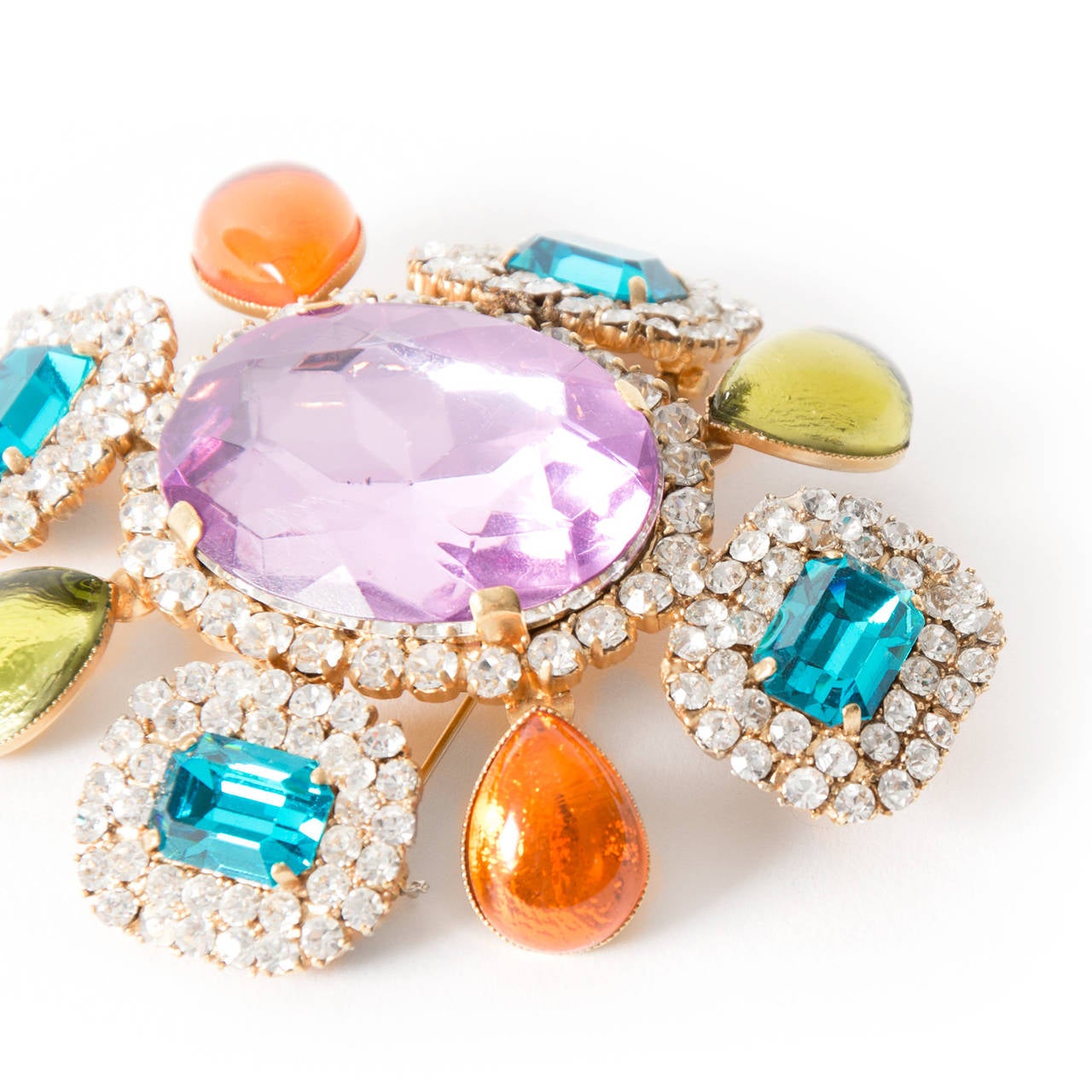 Chanel Multicolor Brooch

Chanel Multicolor Brooch Bold and beautiful, this design from Chanel has a design that is absolutely breathtaking!

Detailed with vibrant orange and green glasstones and purple, turquoise and white colored