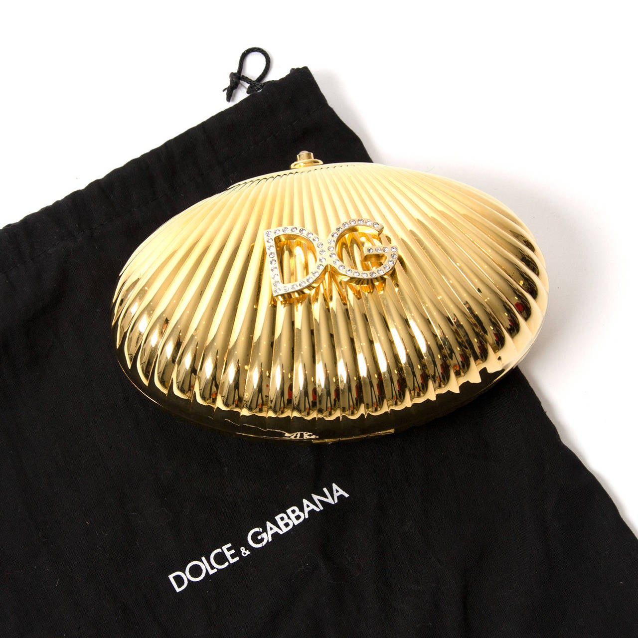 Dolce und Gabbana Goldene Shell-Clutch 1