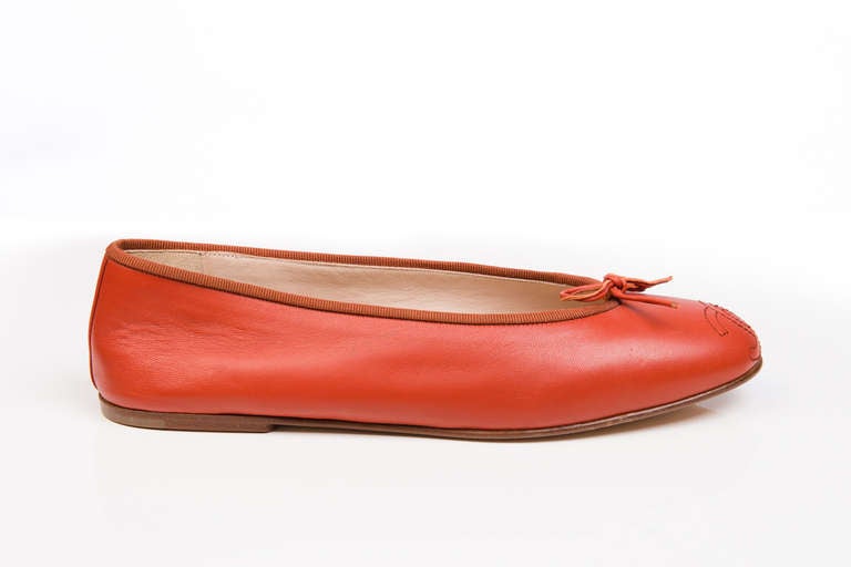 red chanel ballet flats