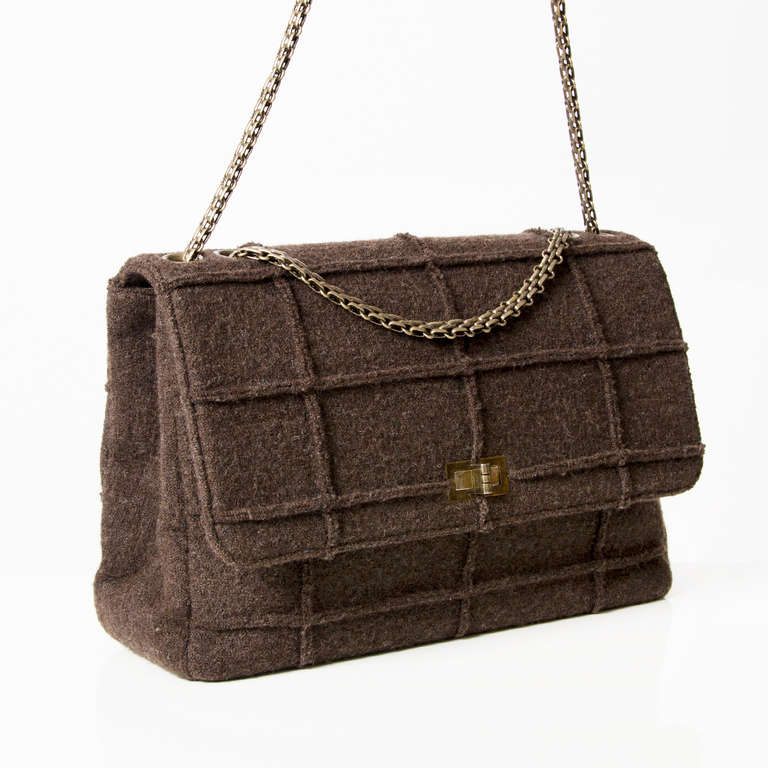 Chanel Identification brown wool flap bag with mademoiselle twist lock. 

The 