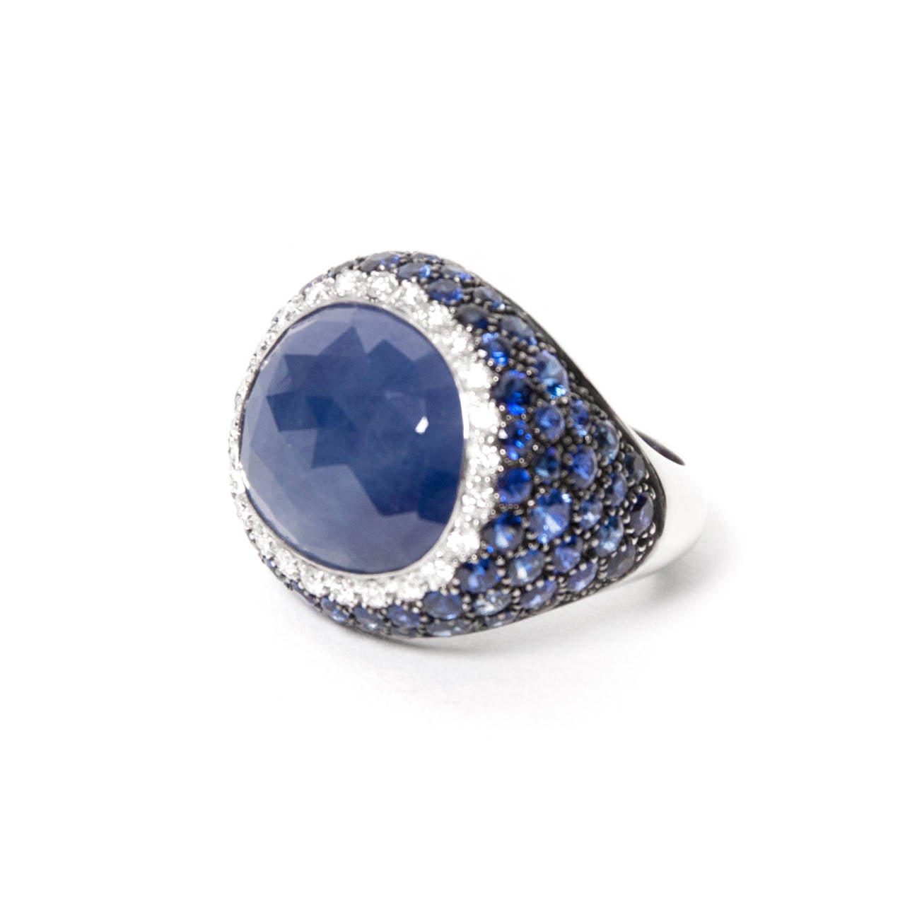 The sapphire stands for Truth, Continuity and Integrity. The woman whose personality fits these poetic qualities will surely fall in love with this Brusi ring. The band is 18 crt gold and is set with a true blue sapphire stone, crowned with 0.42 crt