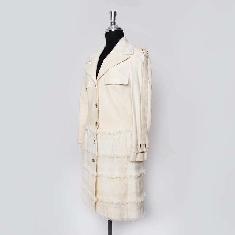 Chanel Paris cream colored 3/4 vest or jacket. Made from cotton tweed and lambskin. With aged gold-tone buttons and sheer flower printed silk lining.