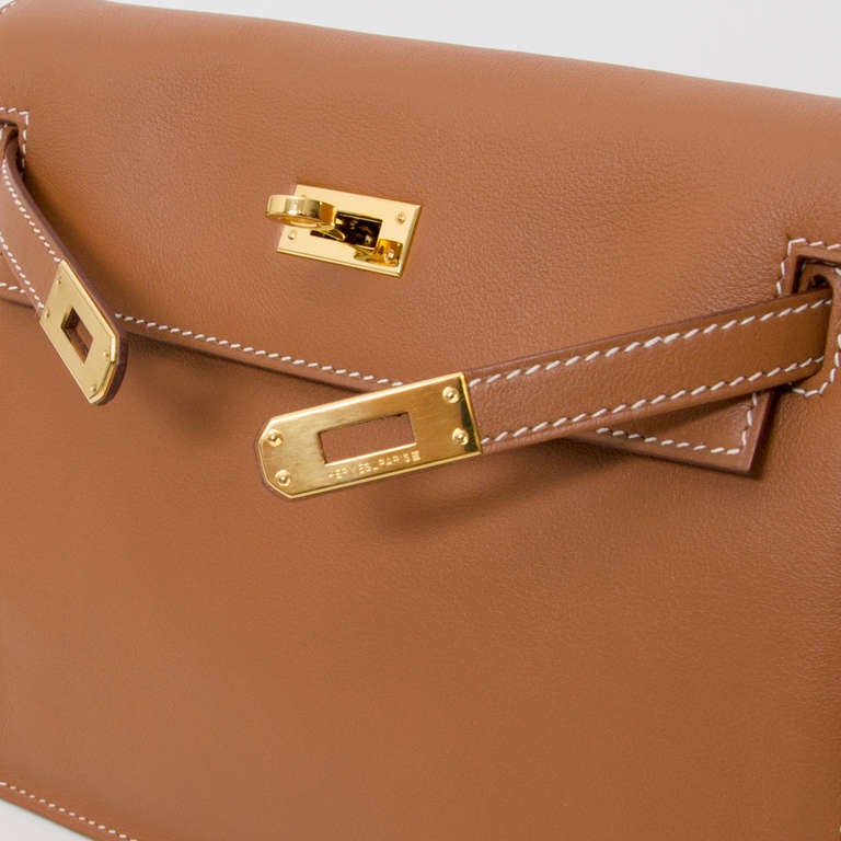 HERMÈS Kelly Danse shoulder bag in Etoupe Swift leather with Gold