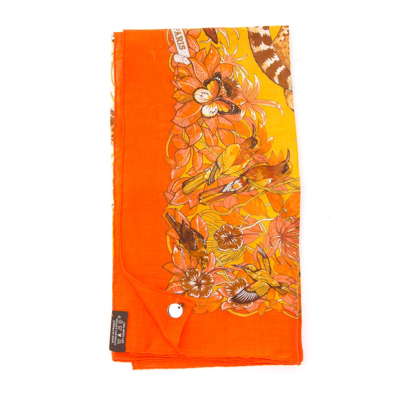 Hermes Jungle Love Cotton Scarf in vibrant orange colours designed by Robert Dallet, a naturalist who works for the National Natural History Museum in Paris.