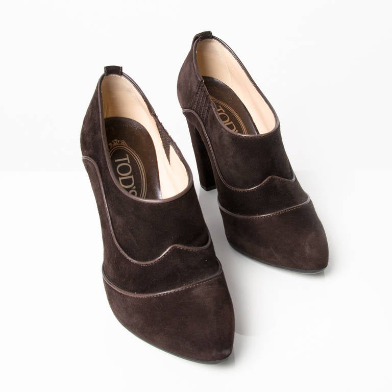 Tod's coffee brown suede booties or mules with 9cm heel. Signature Tod's rRubber soles for extra grip and comfort.