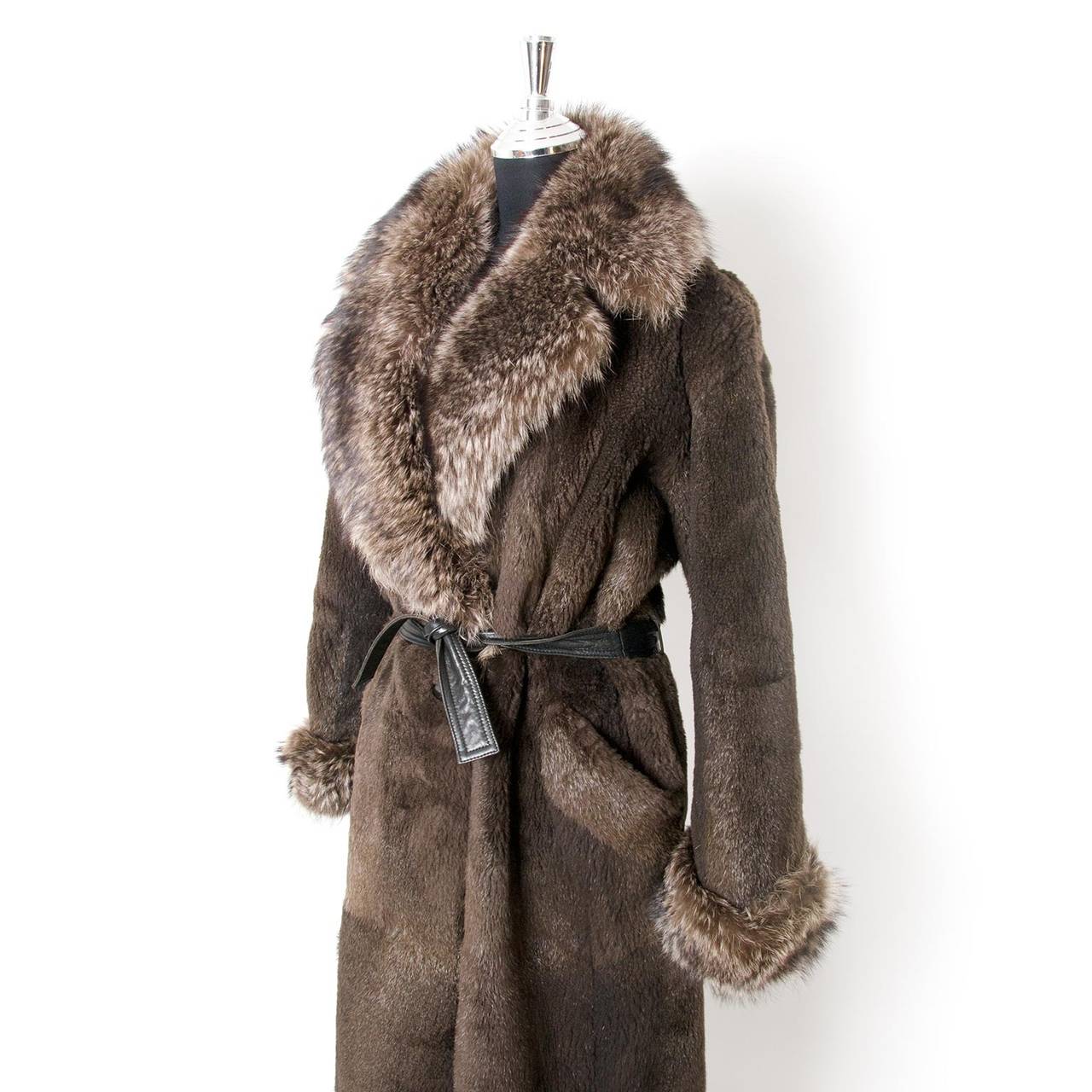 Beautiful Yves Saint Laurent fur coat with leather belt. 
Shoulder length 50cm